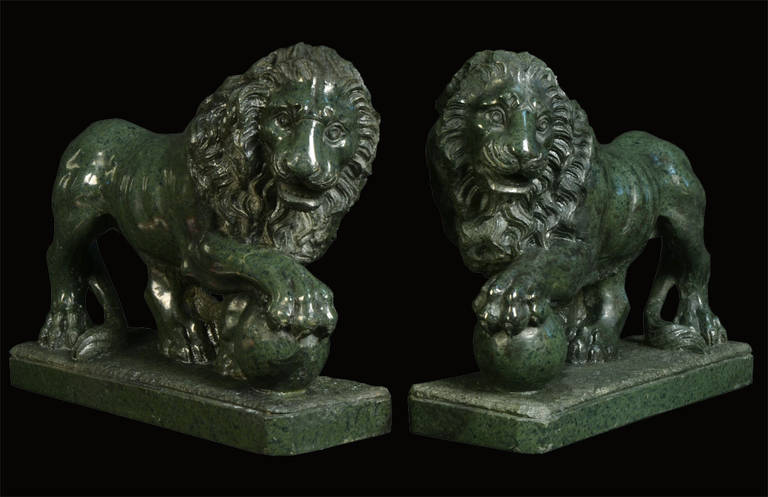 Pair of serpentine Grand Tour lions.