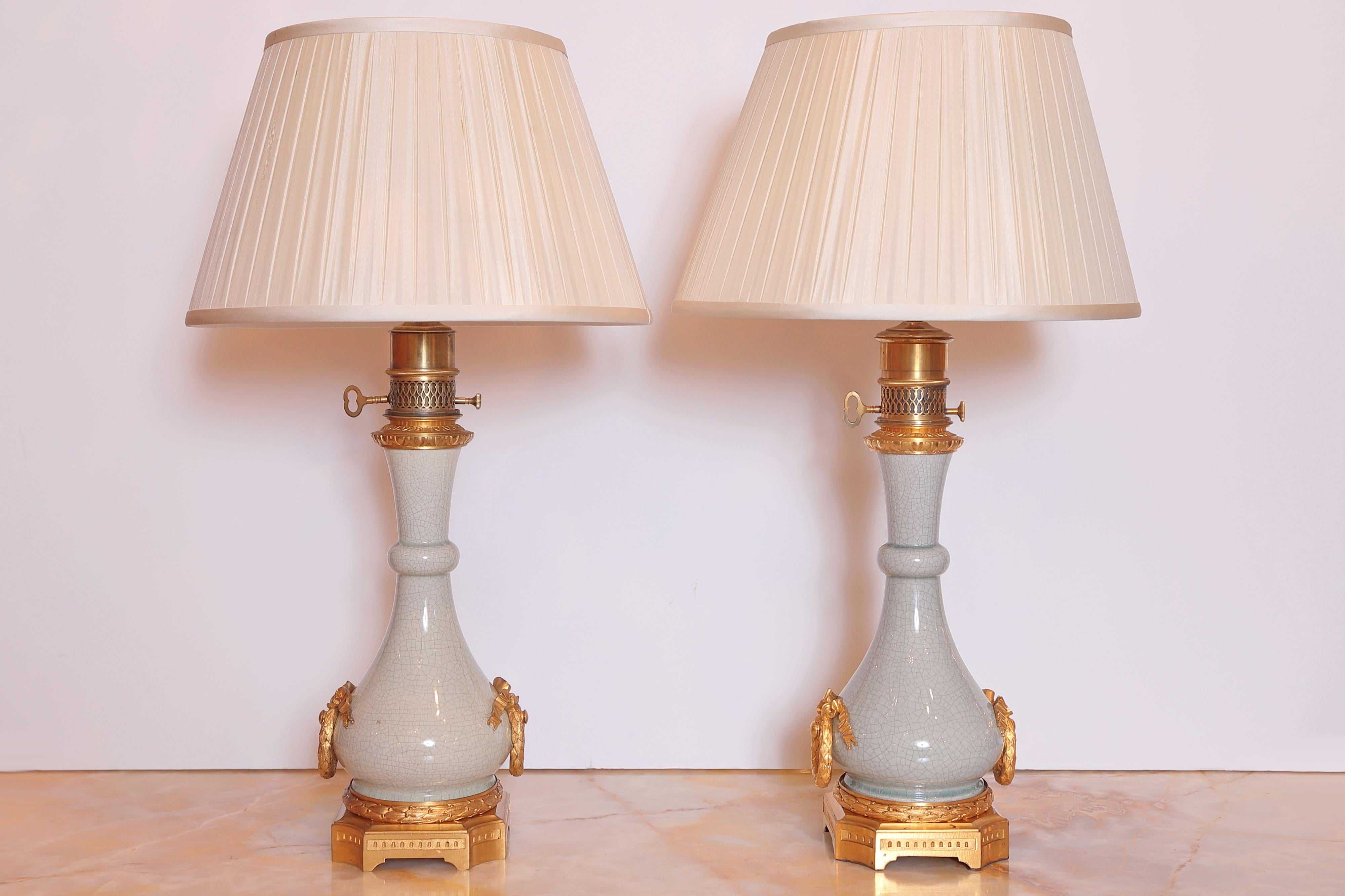 French Pair of Serve's Celadon Porcelain and Gilt Bronze Oil Lamps by Gagneau of Paris