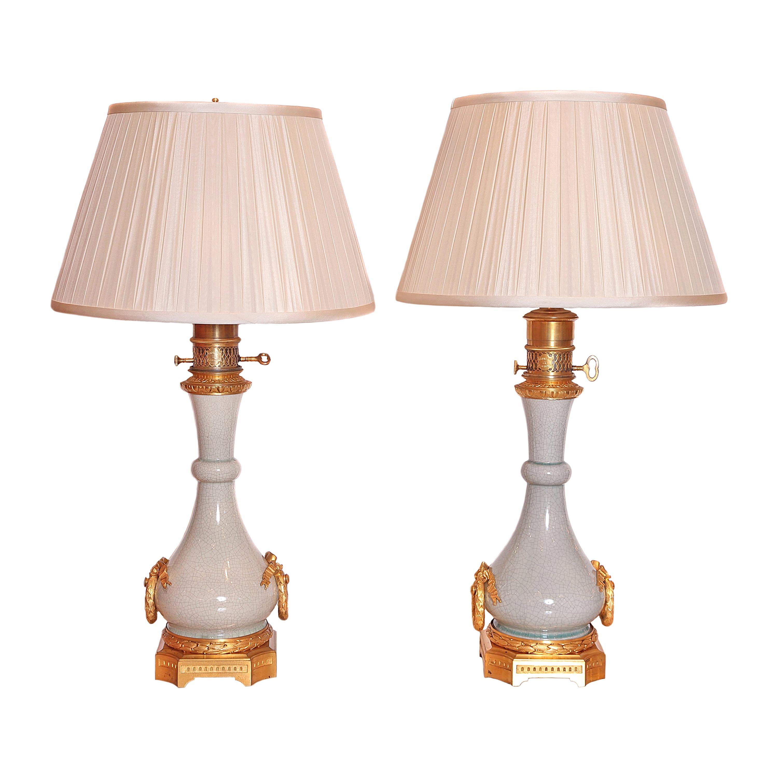 Pair of Serve's Celadon Porcelain and Gilt Bronze Oil Lamps by Gagneau of Paris