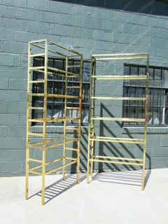 Pair of Seven Foot Tall Mastercraft Brass Display Etageres with Glass Shelves