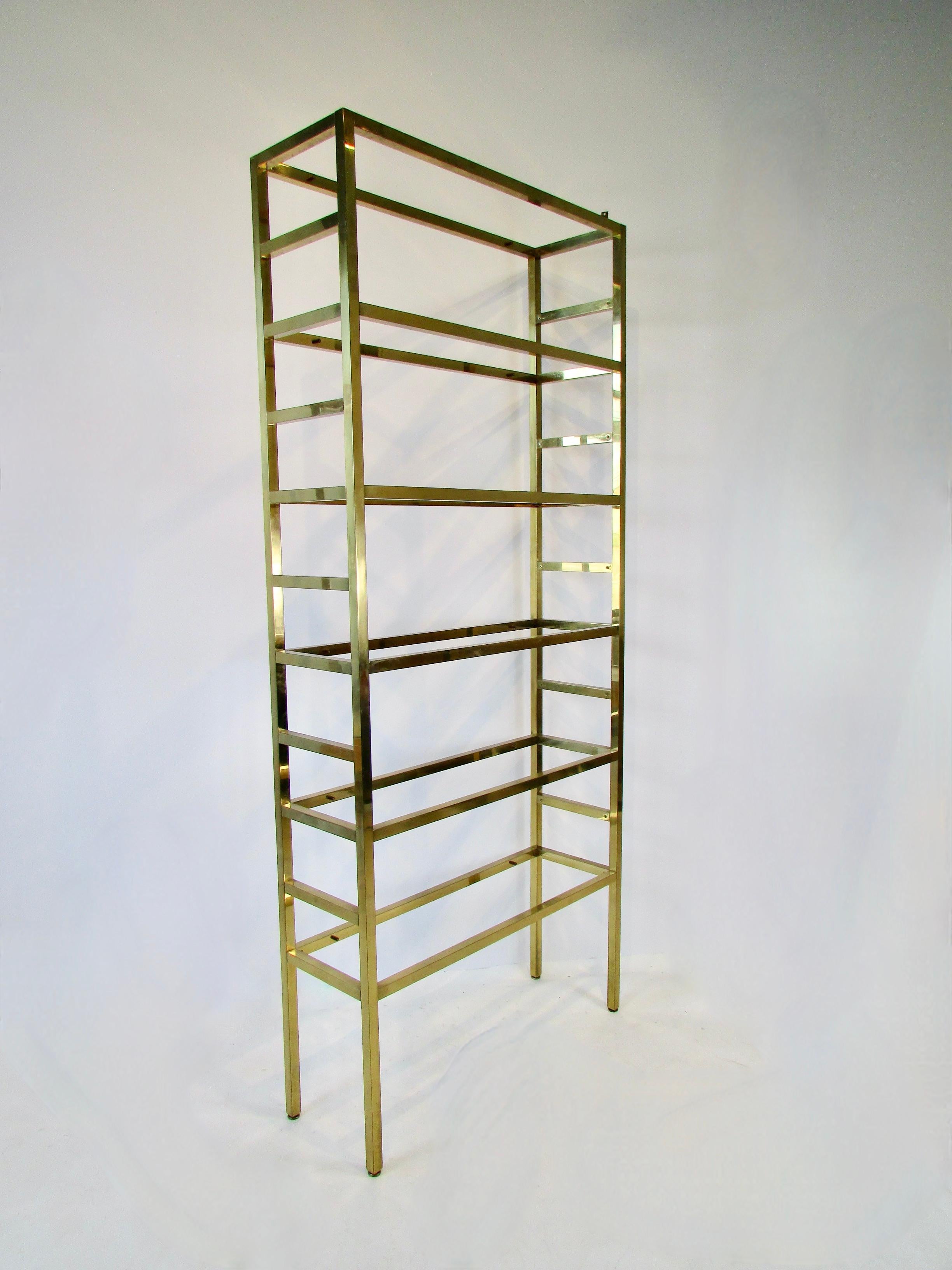 20th Century Pair of Seven Foot Tall Mastercraft Brass Display Etageres with Glass Shelves
