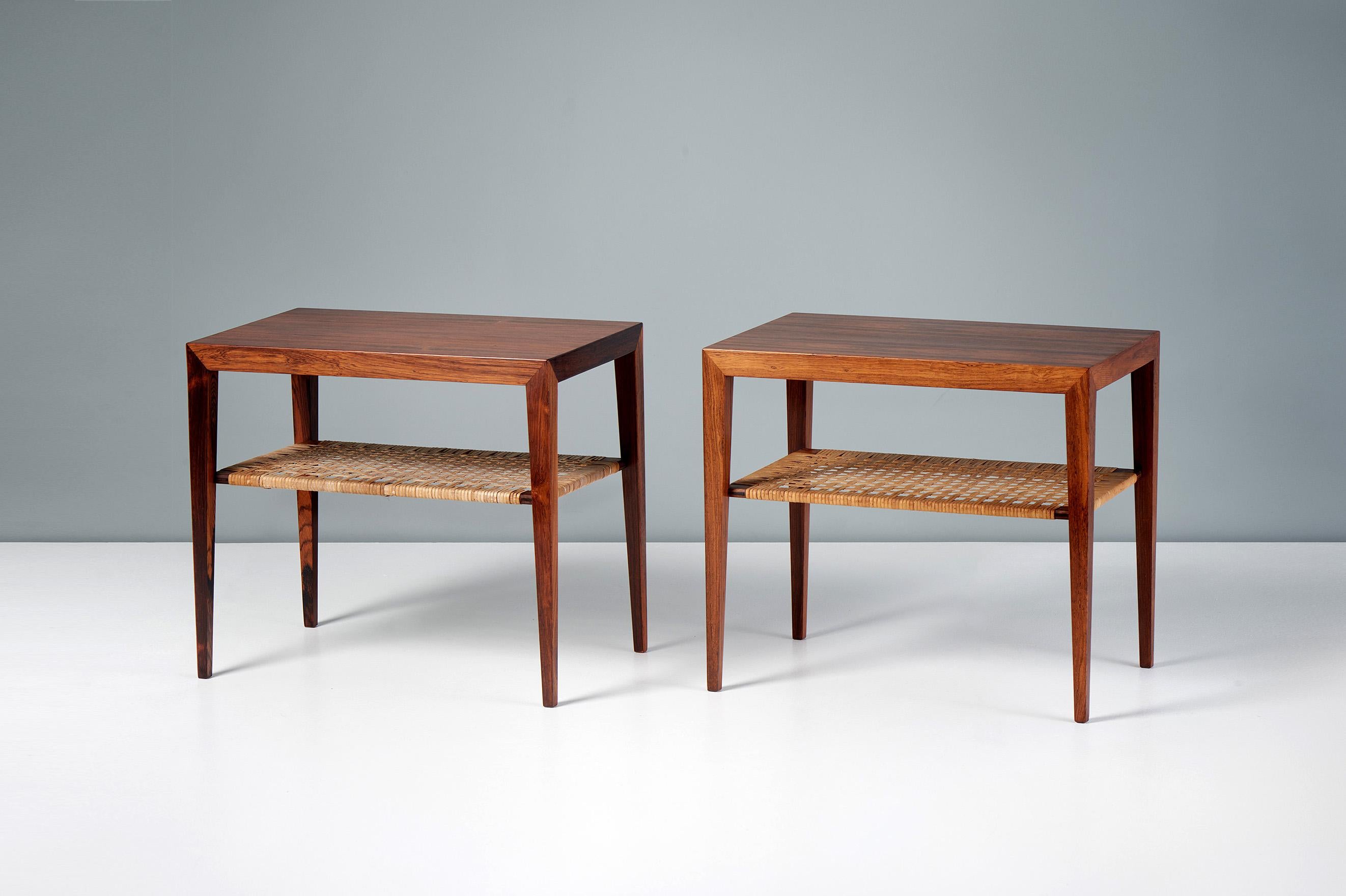 Severin Hansen - Rosewood side Tables, 1950s.

Pair of side tables with original woven rattan cane shelves below. Produced by Haslev Mobelsnedkeri, Denmark in highly figured rosewood veneer with solid legs. Refinished in Danish oil at our workshops