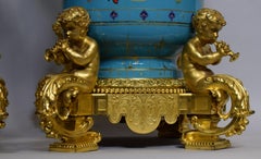 Pair of Sevres Gilt Bronze & Porcelain Urns