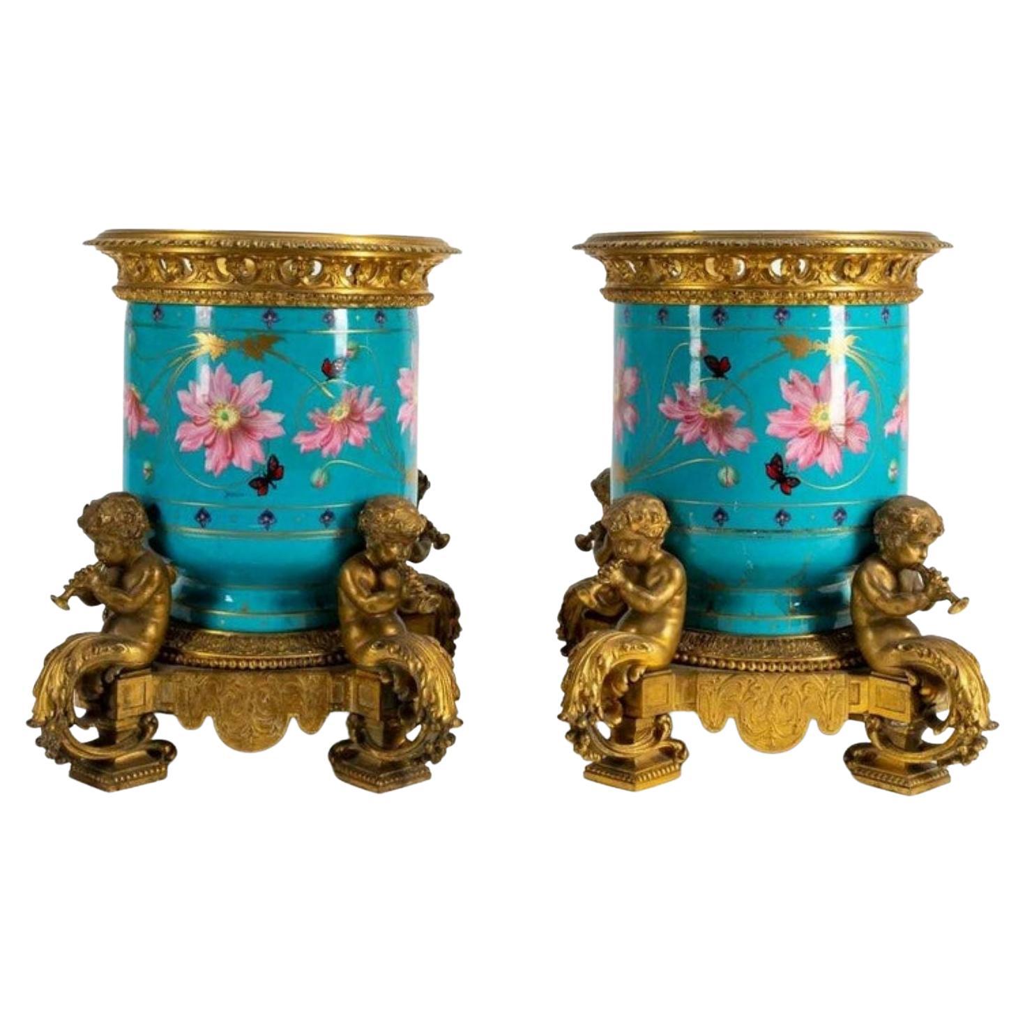 Pair of Sevres Gilt Bronze & Porcelain Urns For Sale