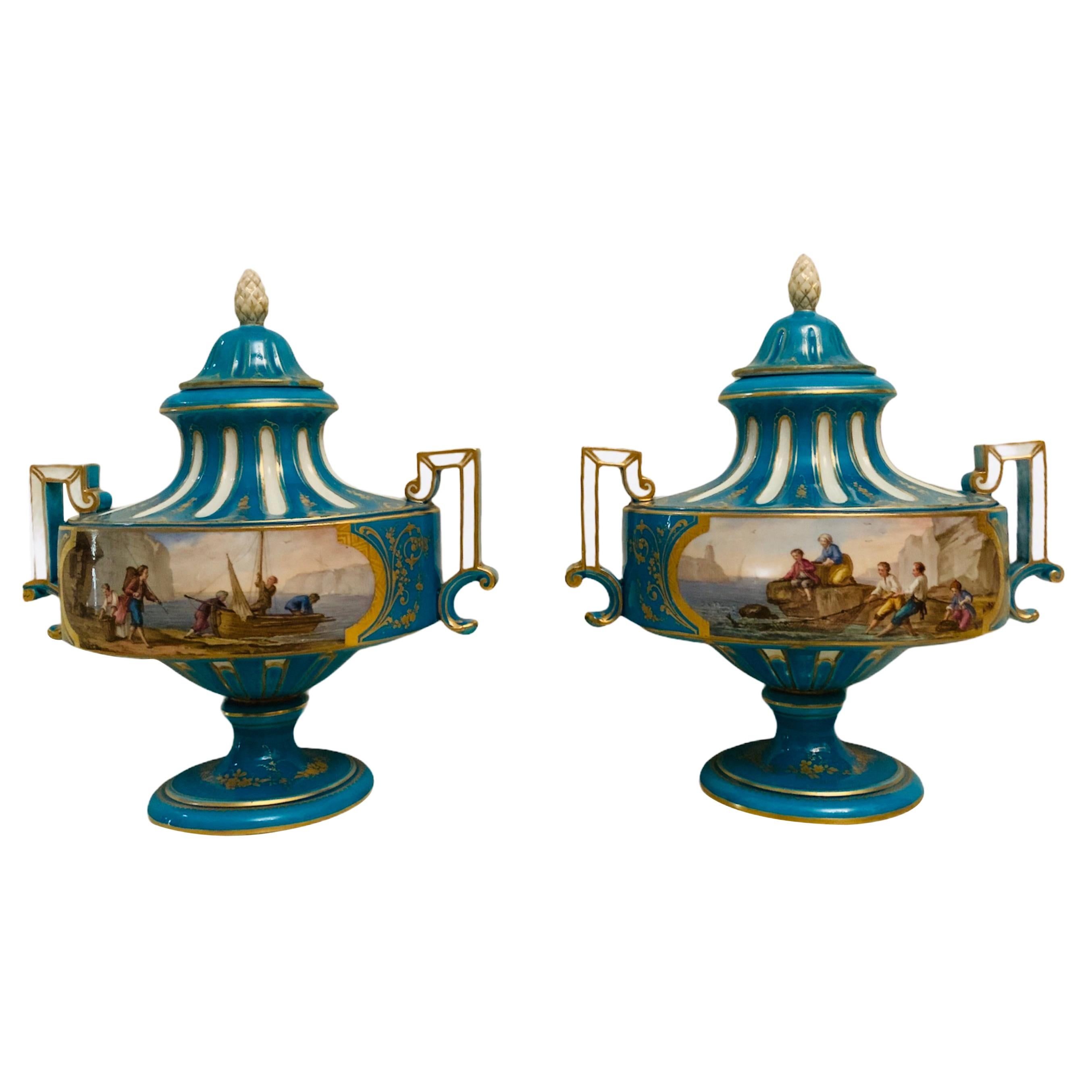 Pair of Sevres Hand Painted Turquoise Porcelain Lidded Urns