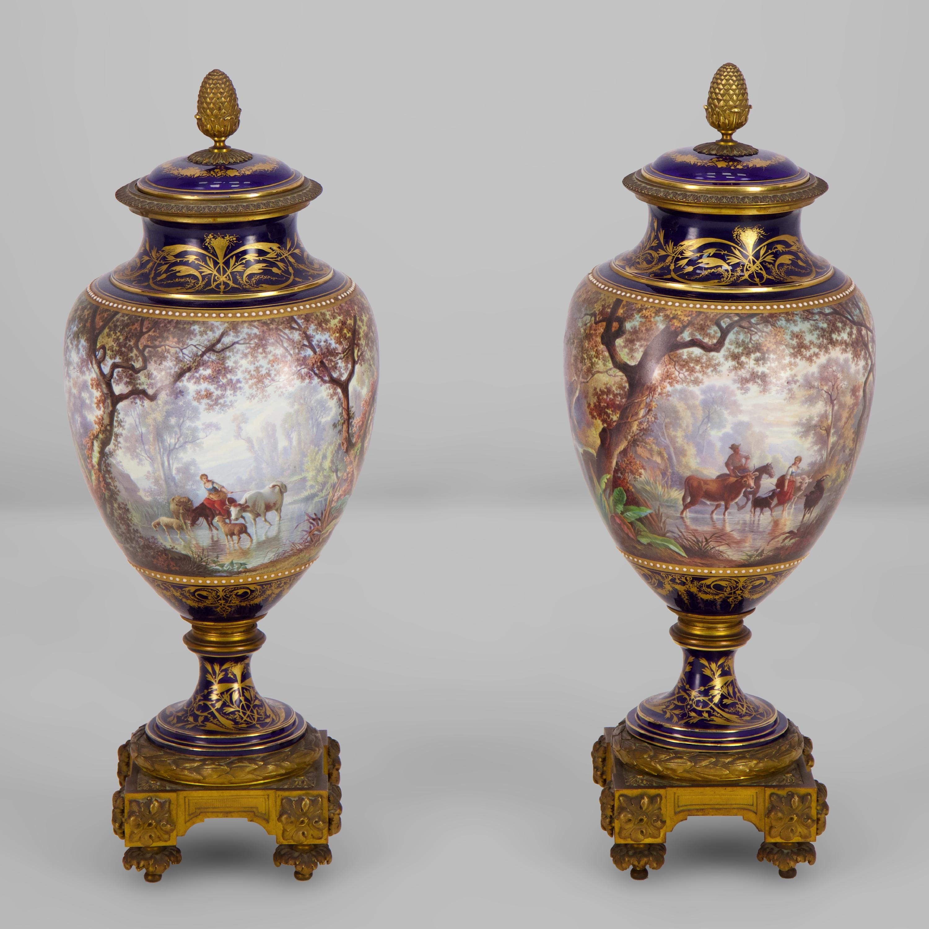 This beautiful pair of covered vases made of porcelain originally comes from the Manufacture of Sèvres where the white pieces were bought in 1869, decorated then mounted in gilt bronze by J. Machereau.

He is designated as “ porcelain painter and