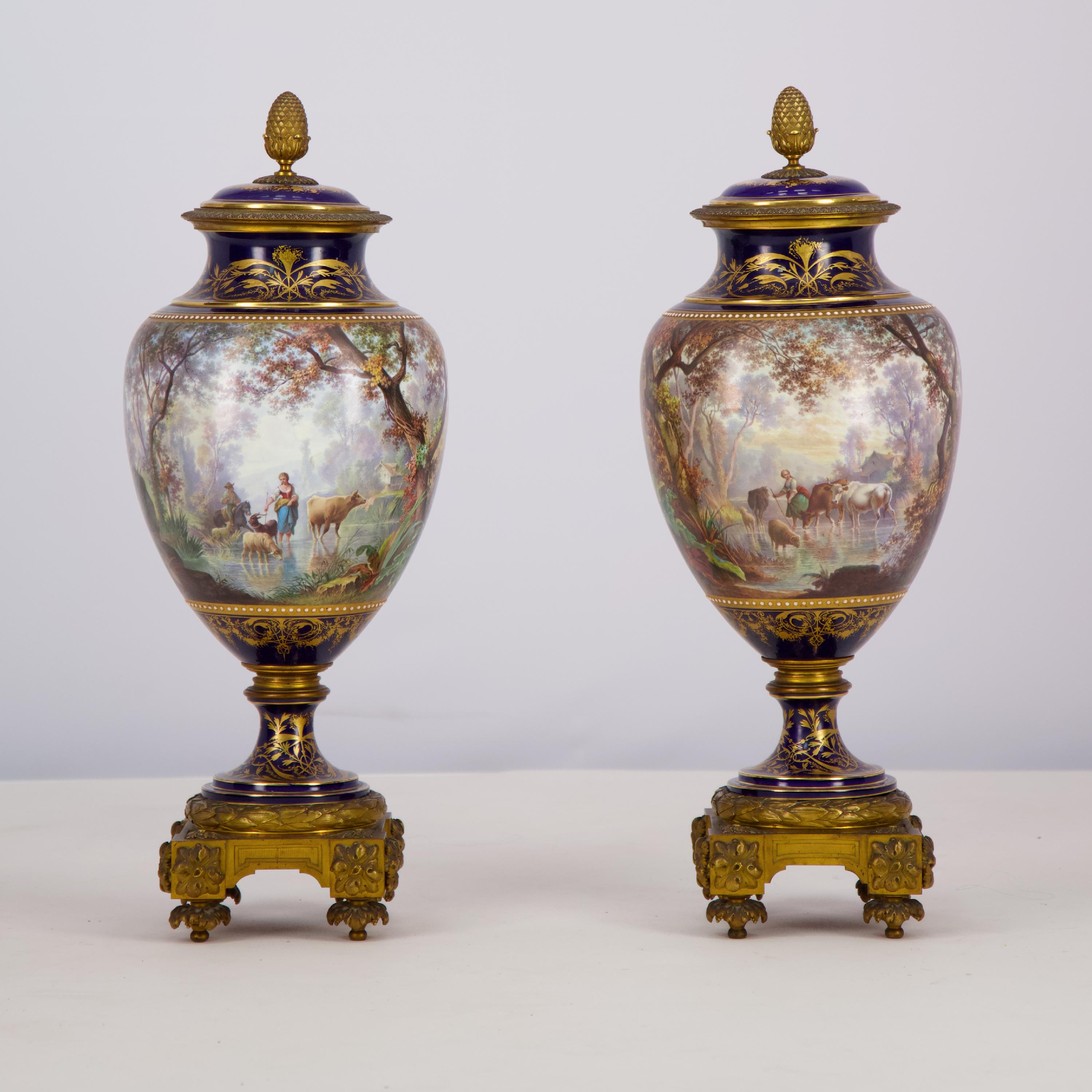 Gilt Pair of Sèvres porcelain vases mounted in gilt bronze painted by J. Machereau For Sale