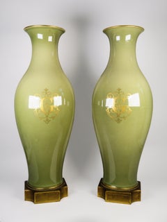 Pair of Sevres porcelain vases with monogram and bronze mounts, France