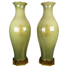 Pair of Sevres porcelain vases with monogram and bronze mounts, France