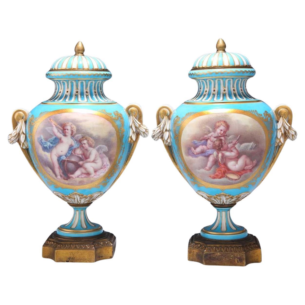 Pair of Sevres Style Bleu Celeste Hand-Painted Putti Lidded Vases 19th Century