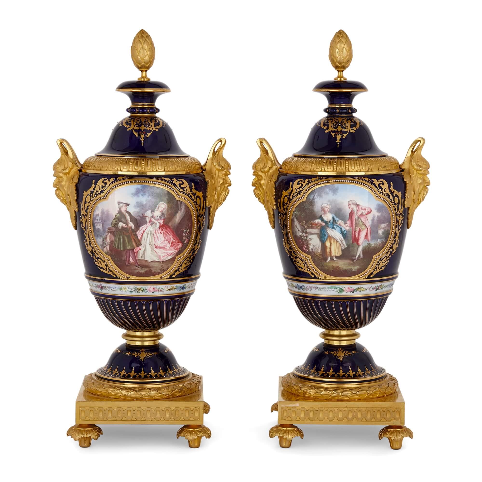 Pair of Sèvres style gilt bronze and jewelled porcelain vases 
French, Late 19th Century 
Height 46cm, width 21cm, depth 16cm

Made in the style of the famous Sèvres porcelain manufactory, this charming pair of vases depict figural as well as nature