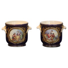 Pareja de macetas de porcelana de estilo Sevres