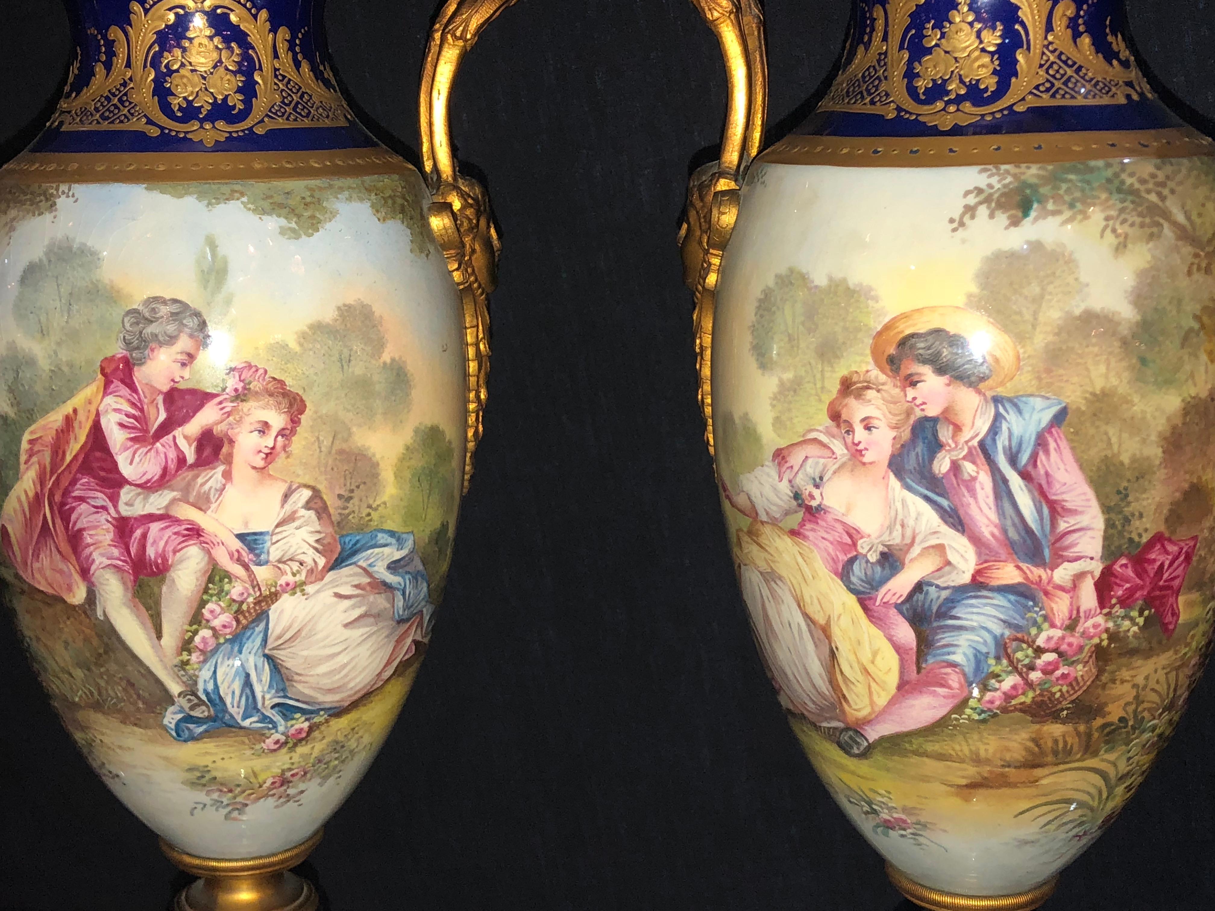 Pair of Sevres Vases Signed with Bronze Mounts and Masked Handled Sides 4