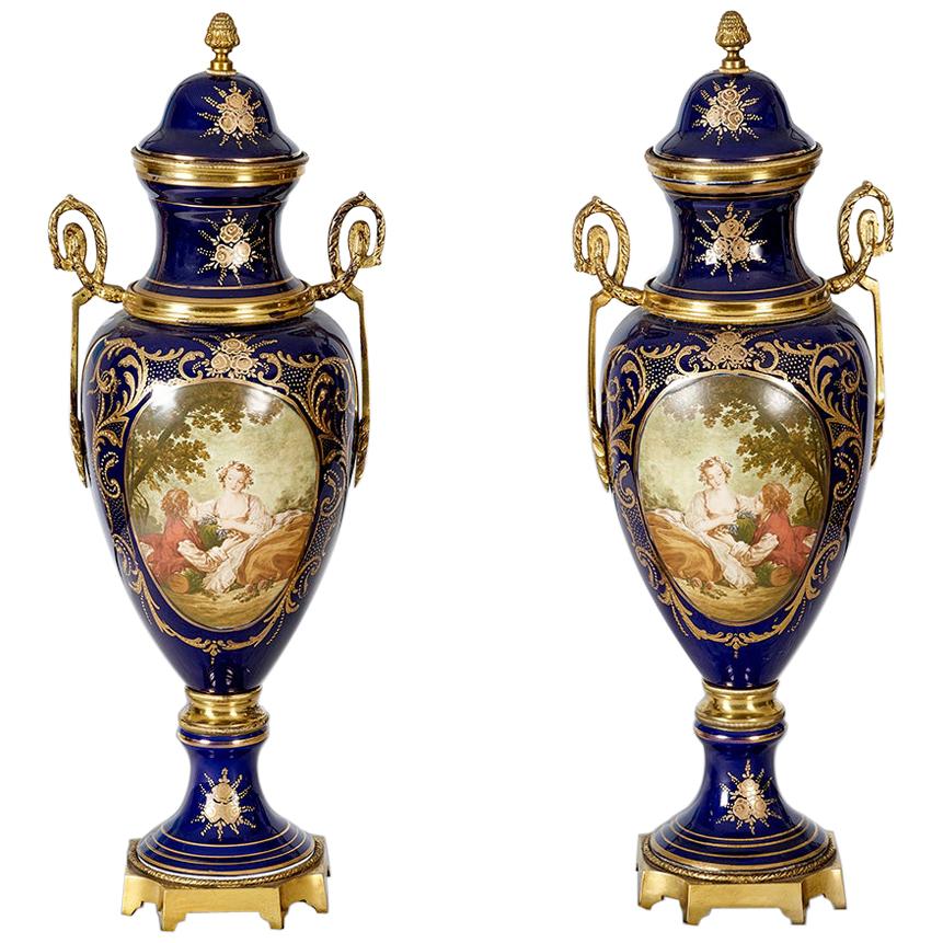 Pair of Sèvres Vases With Bronze Mounts and Handled Sides