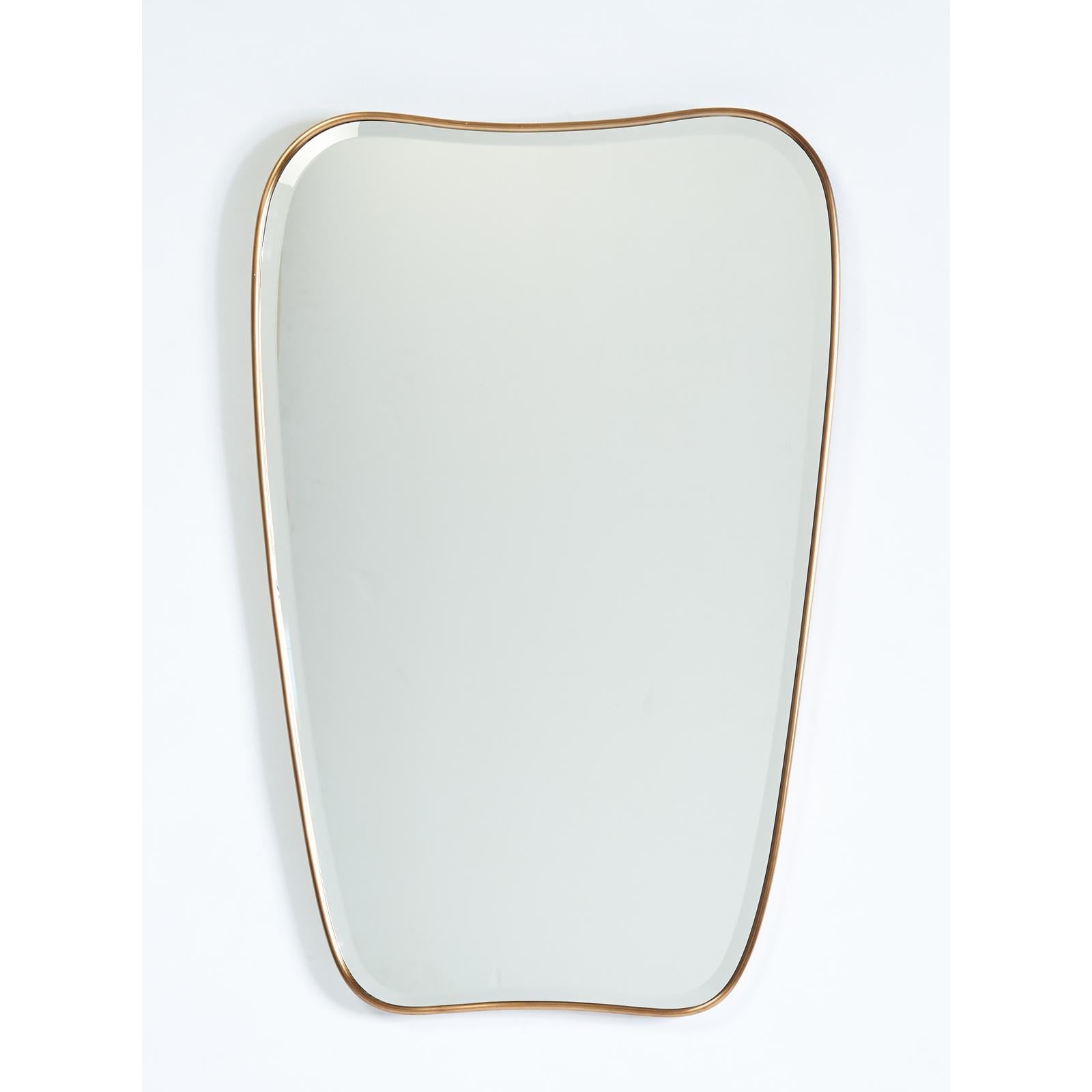 Italy, 1950s
A single shaped brass mirror, beveled glass
Dimensions: 28 H x 17.5 W x 1 D
One available, one sold.
Sold and priced individually.


 