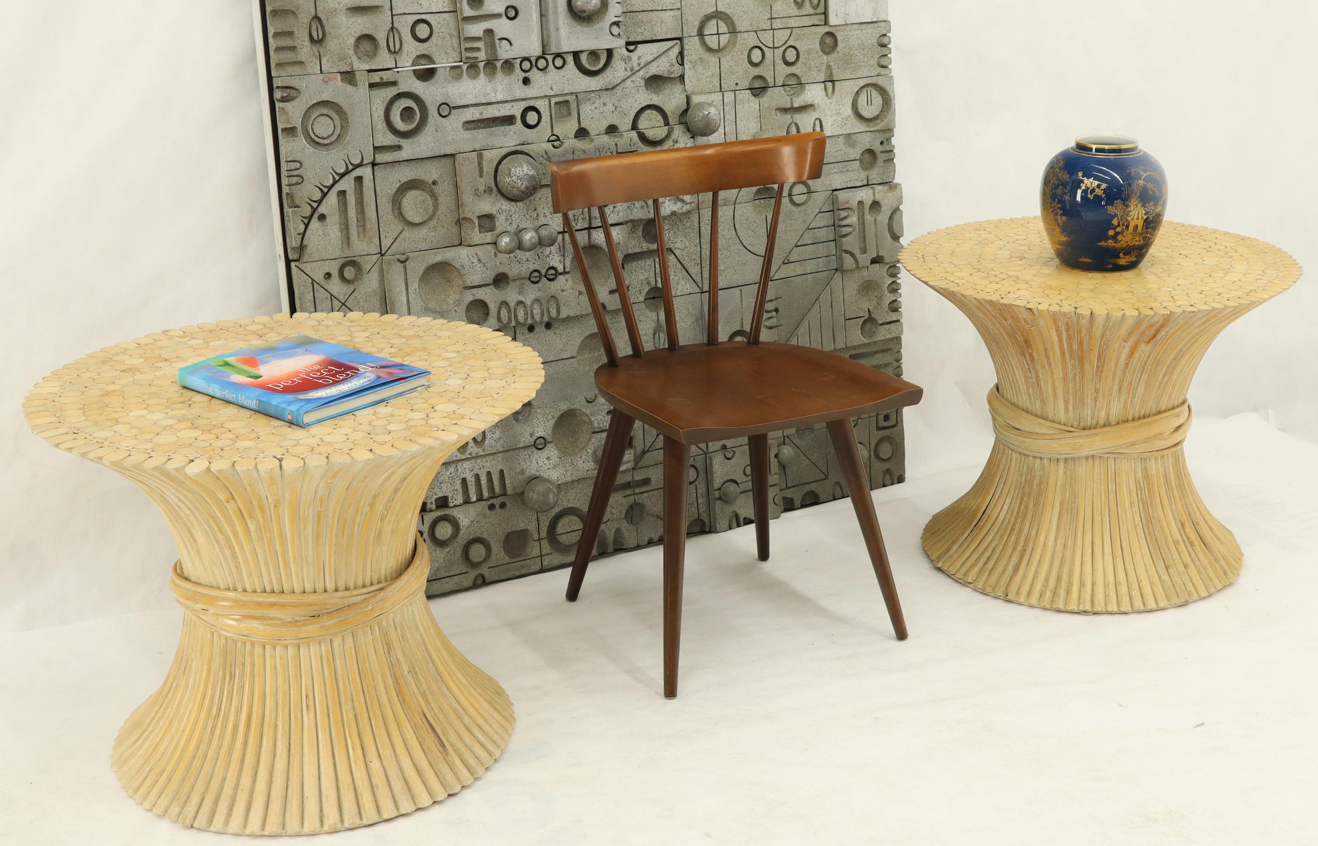 Pair of Mid-Century Modern round sheaf of bamboo or wheat end side occasional tables guerdons.
 