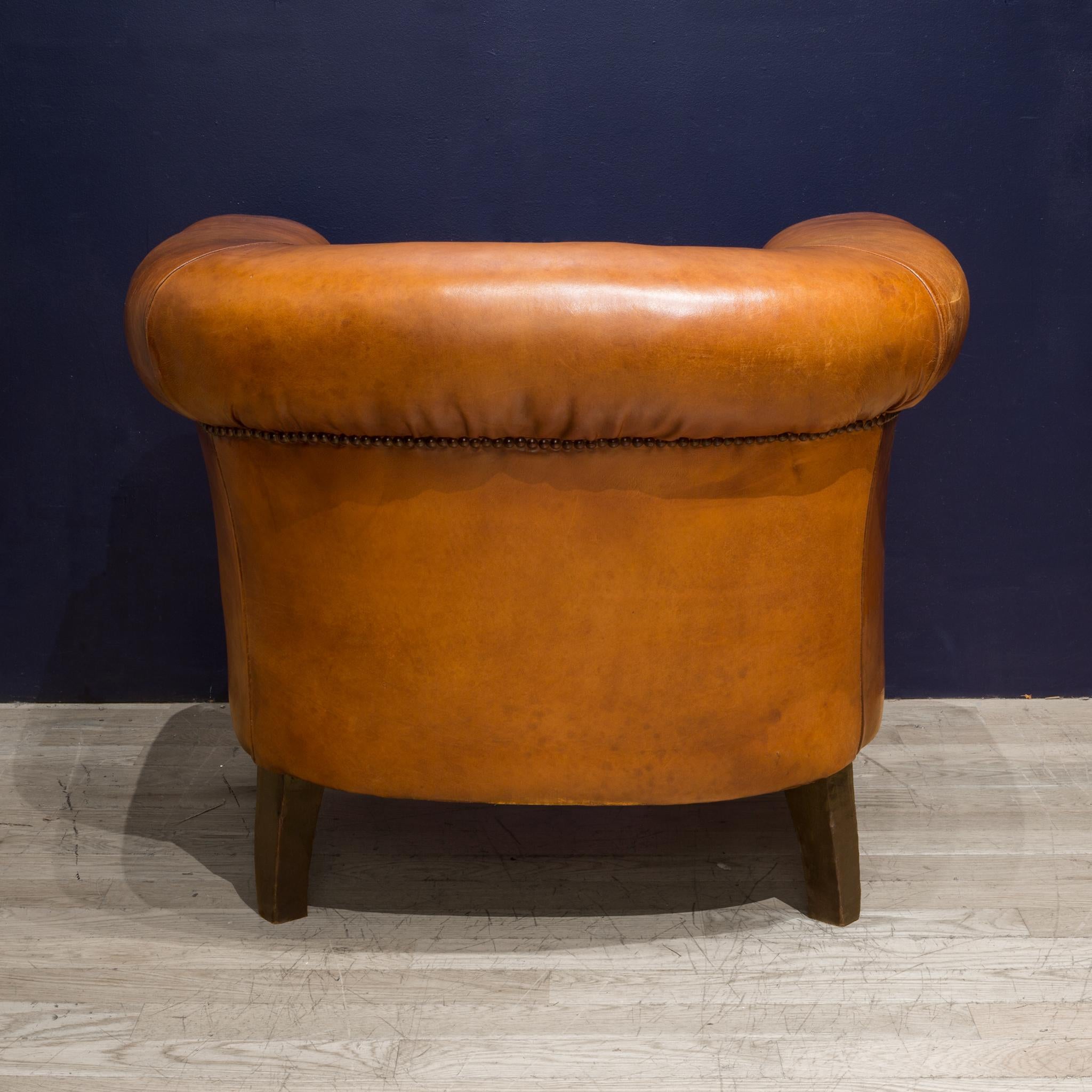 Sheep Hide French Round Club Chairs with Bakelite and Brass Casters , circa 1940 In Good Condition In San Francisco, CA