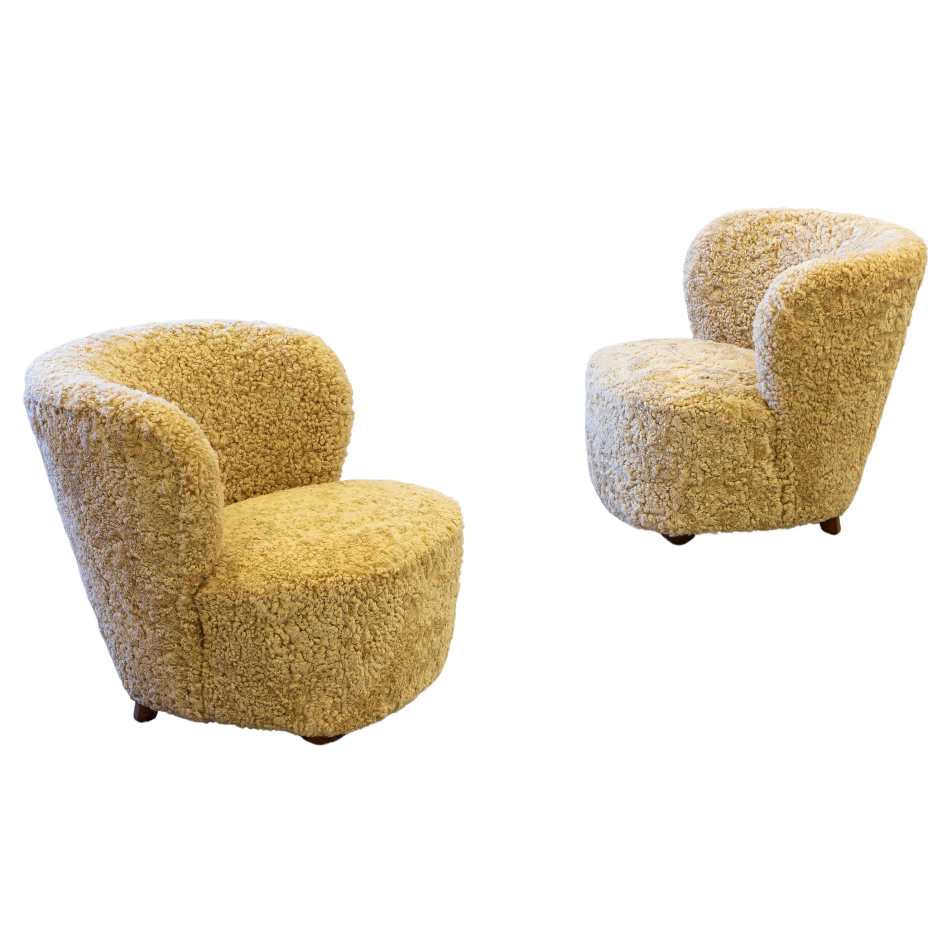 Pair of sheepskin chairs in the manner of Viggo Boesen, Danish modern, 1940s For Sale