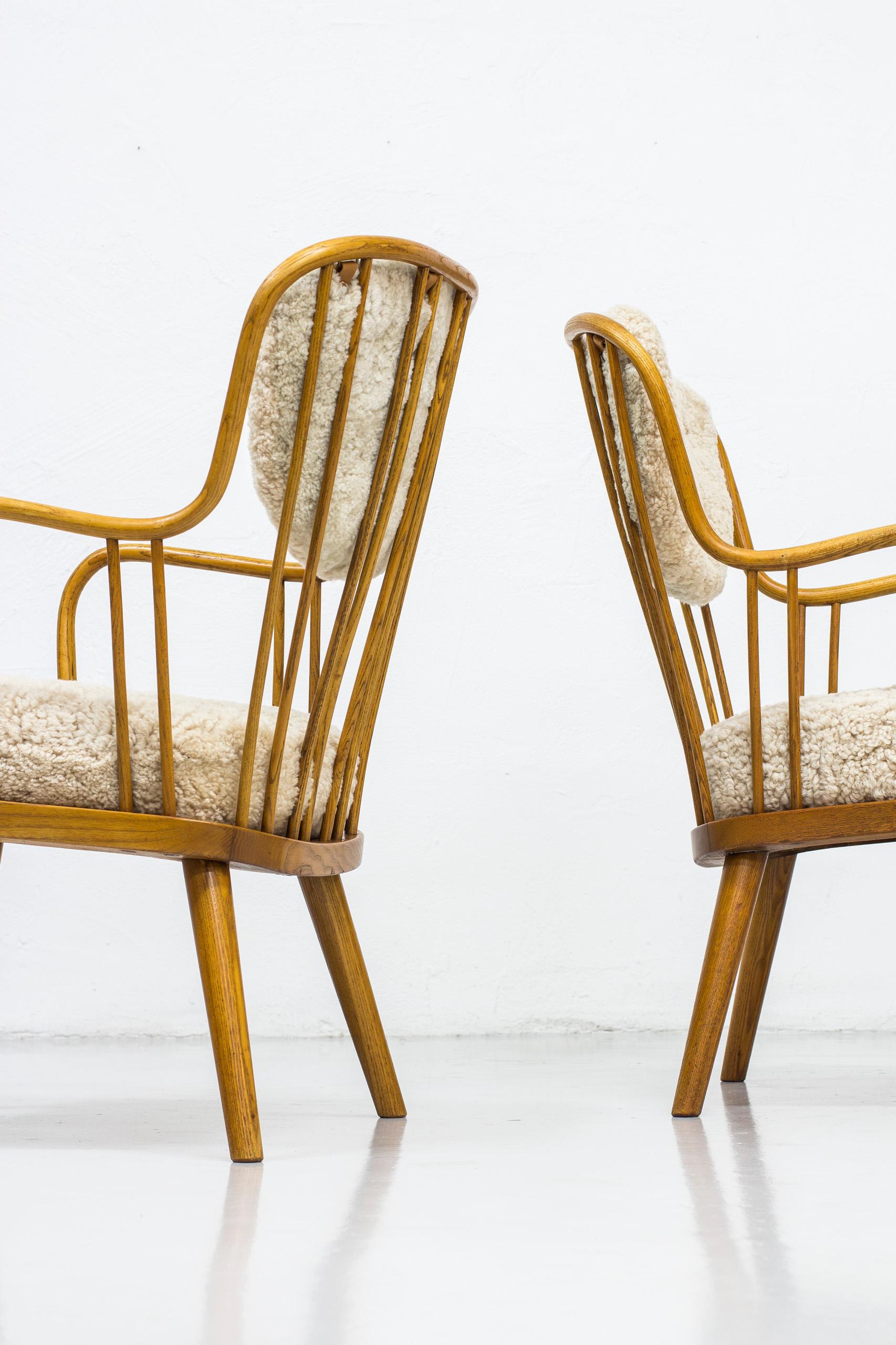 Scandinavian Modern Pair of Sheepskin Easy Chairs by Aage Herman Olsen, Denmark, 1940s