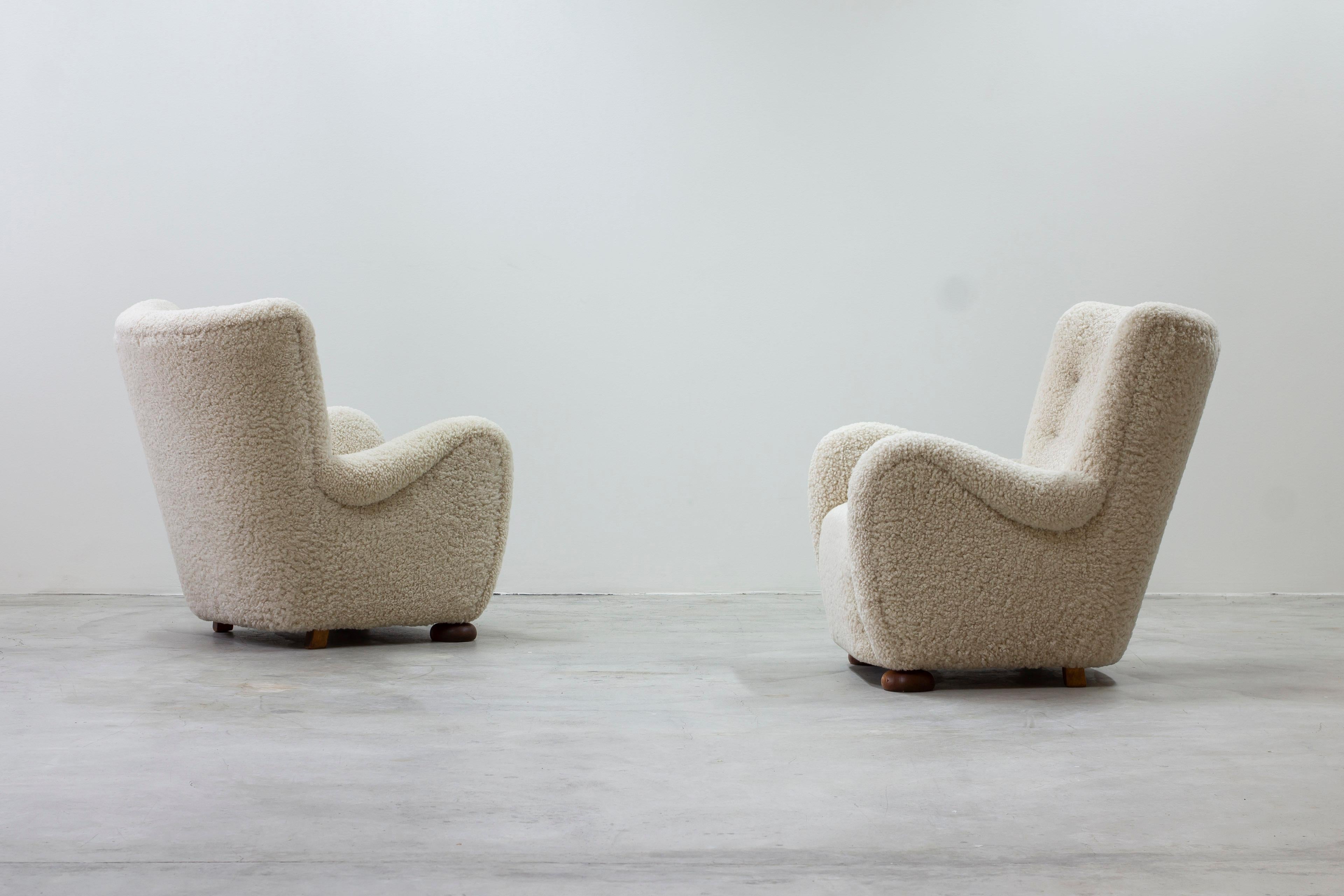 Danish Pair of sheepskin lounge chairs in the manner of Märta Blomstedt, DENMARK, 1940S For Sale