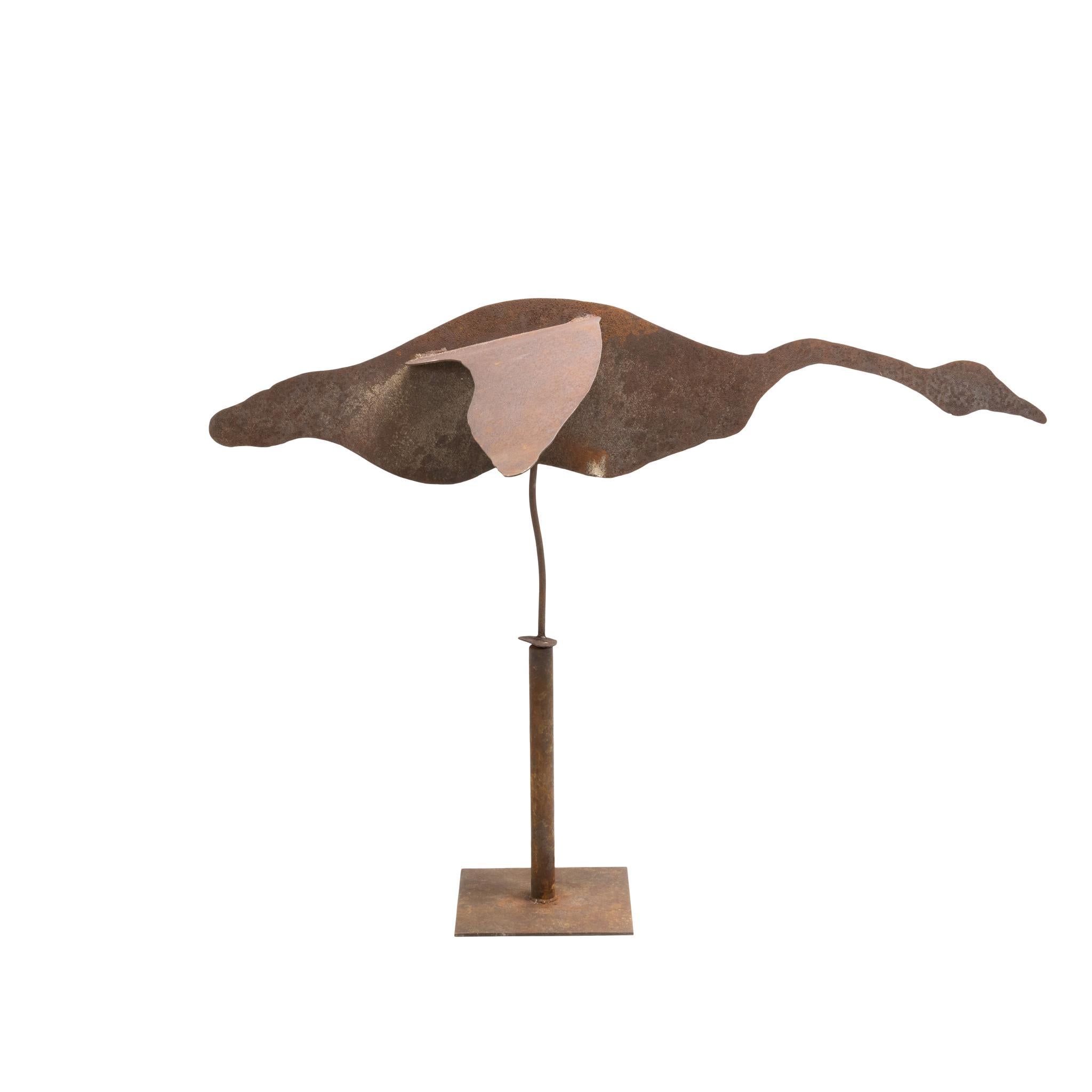 Large piece of flying geese whirligigs done in a silhouette style. They are constructed of thin slabs of cut sheet metal crafter into the primitive shapes of flying geese. Metal has great patina and some rust. They are constructed onto sturdy bases