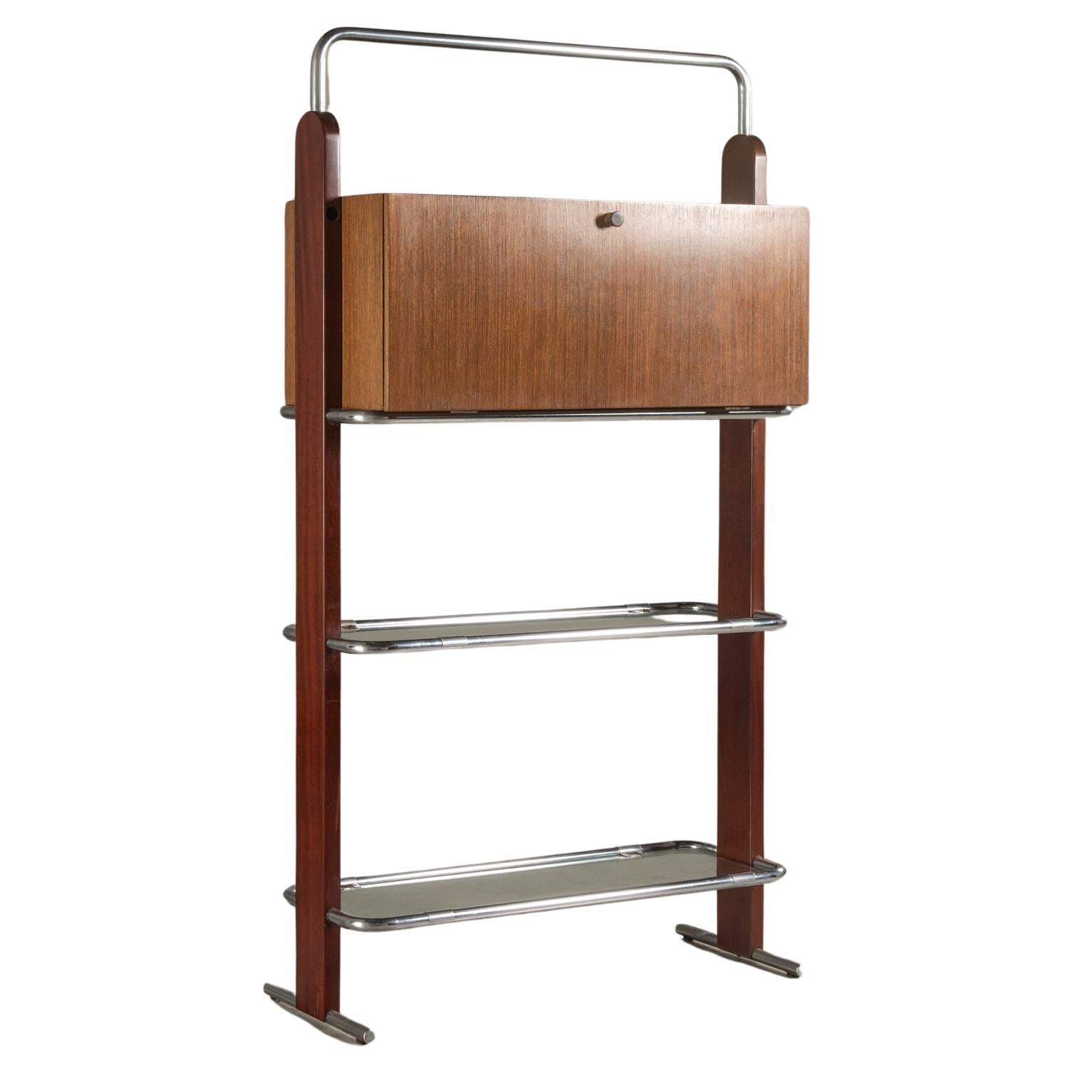 This shelf unit is a distinctive piece of mid-20th century Brazilian design by Percival Lafer. It is a quintessential example of the era's fusion of materials and aesthetics, highlighting the modernist design philosophy that was prevalent at the