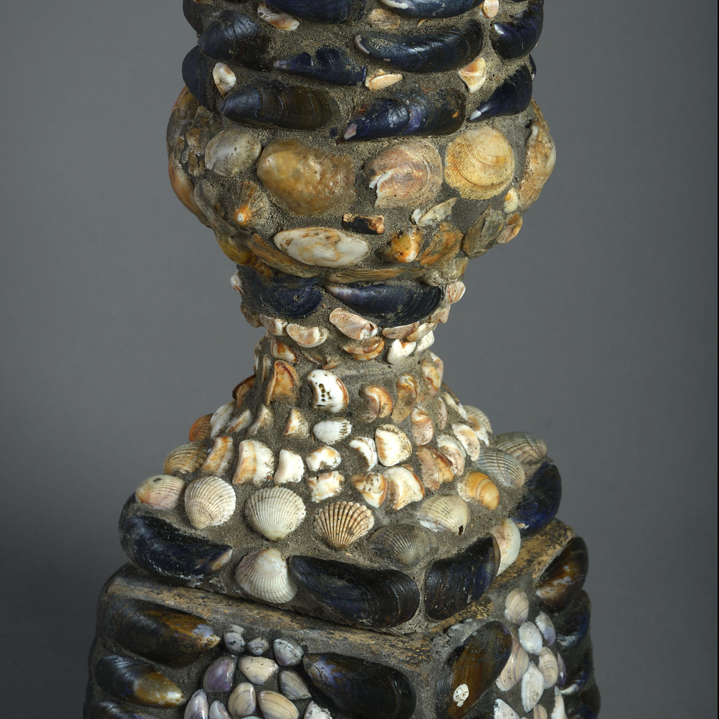 English Pair of Shell Encrusted Urns on Plinths