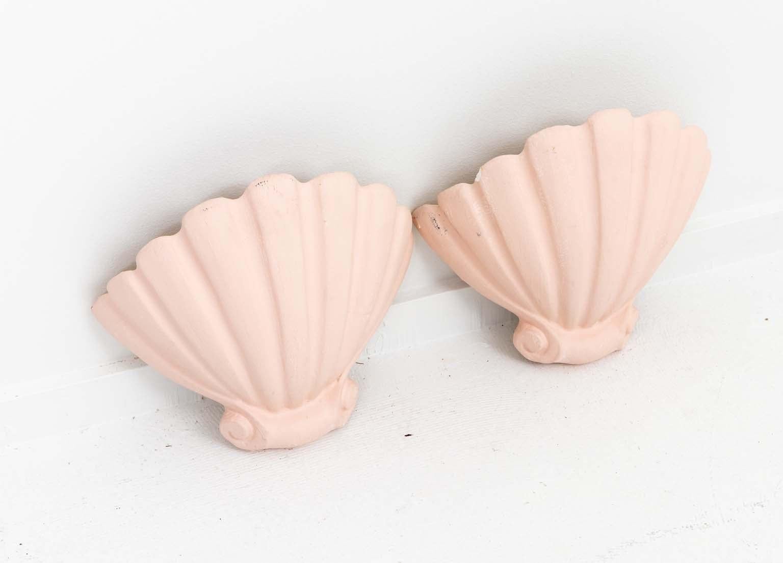 Pair of Plaster Shell Form Wall Sconces, circa 1940,  each fitted for electricity, realistically modeled, in  a soft pink color . 
