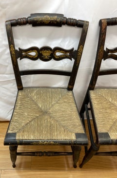 Pair of Sheraton fancy early 19th century Hitchcock chairs with rush seats