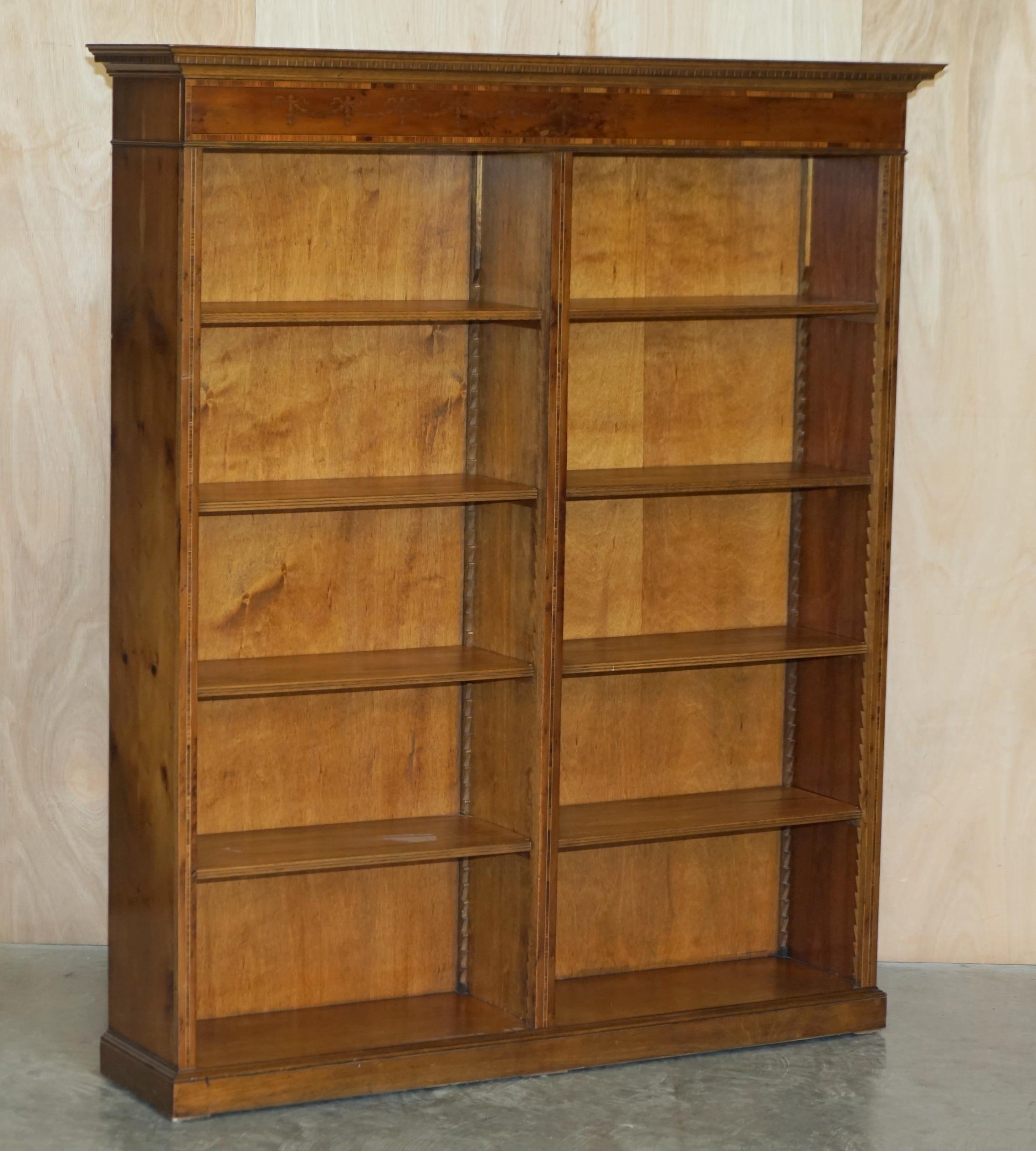 We are delighted to offer for this stunning pair of Sheraton Revival large open library bookcases in light satinwood with burr walnut & yew

A very good looking well made and decorative pair, the shelves are all height adjustable and or removable