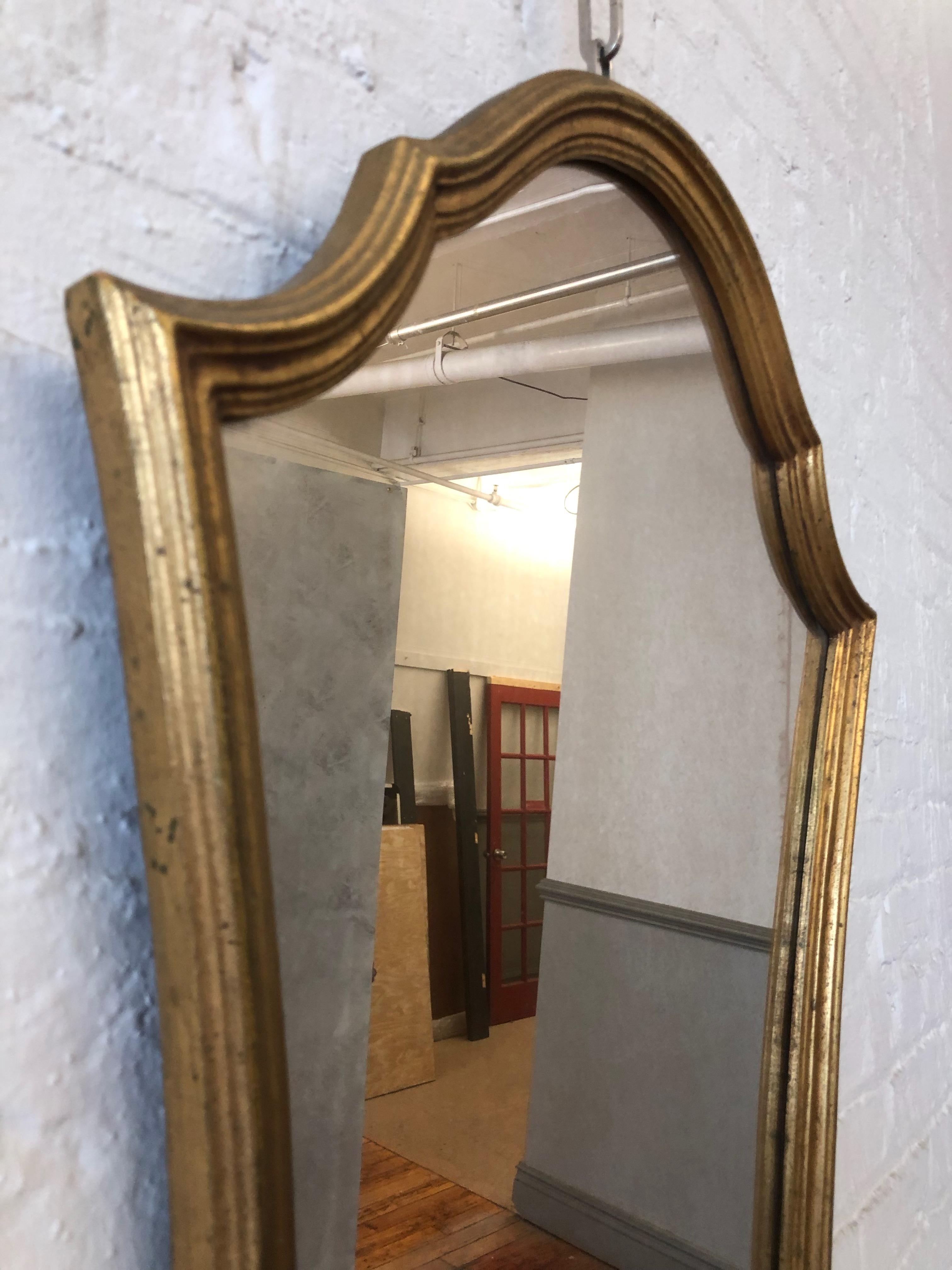Pair of French Mid 20th Century Gilt Shield Form Mirrors In Good Condition In Buchanan, NY