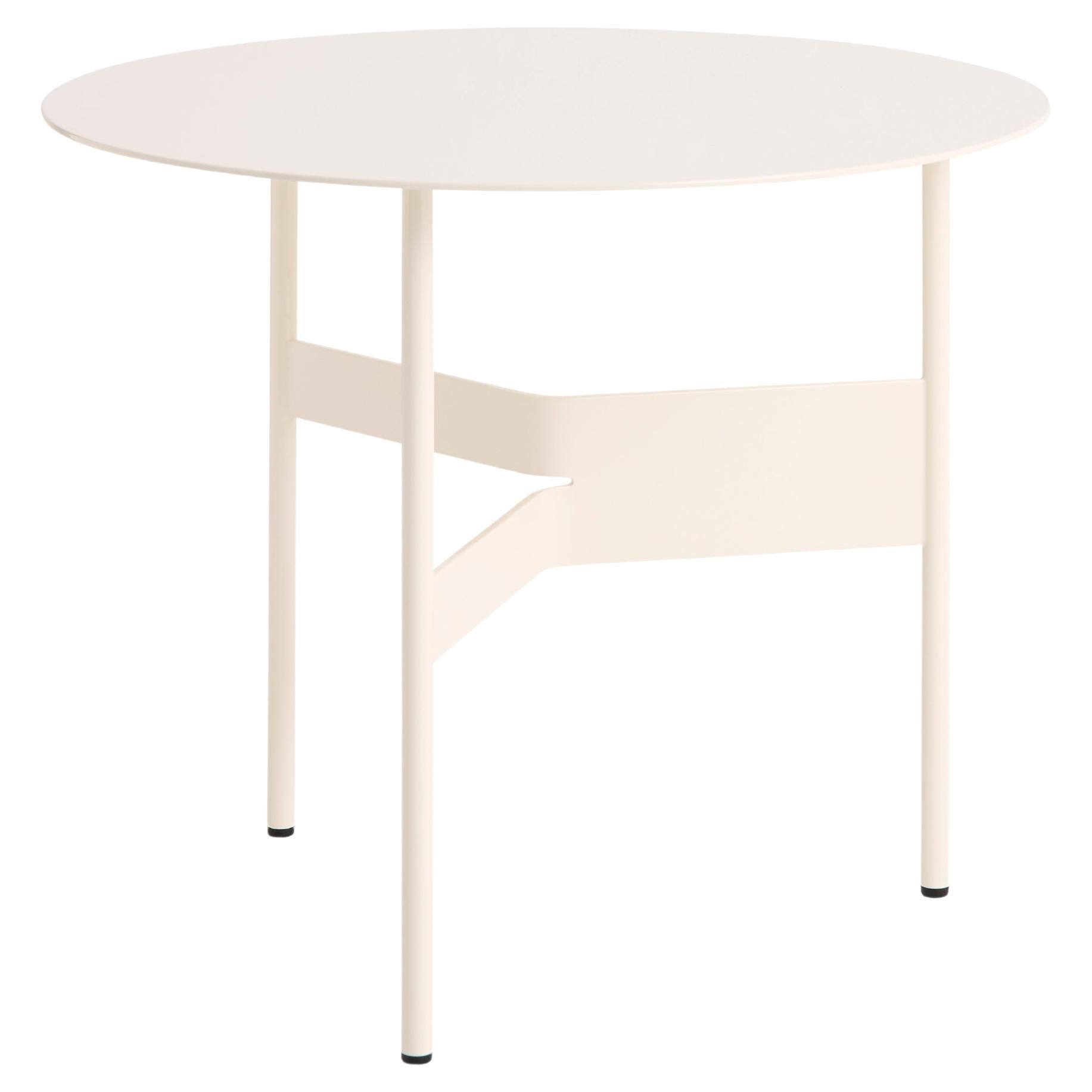 Designed by Jonas Trampedach, Shim Coffee Table is a versatile coffee table in steel featuring a three-legged design. 
The table legs feature a unique cut and bent construction that creates a simple yet sculptural expression. 
Available in two sizes