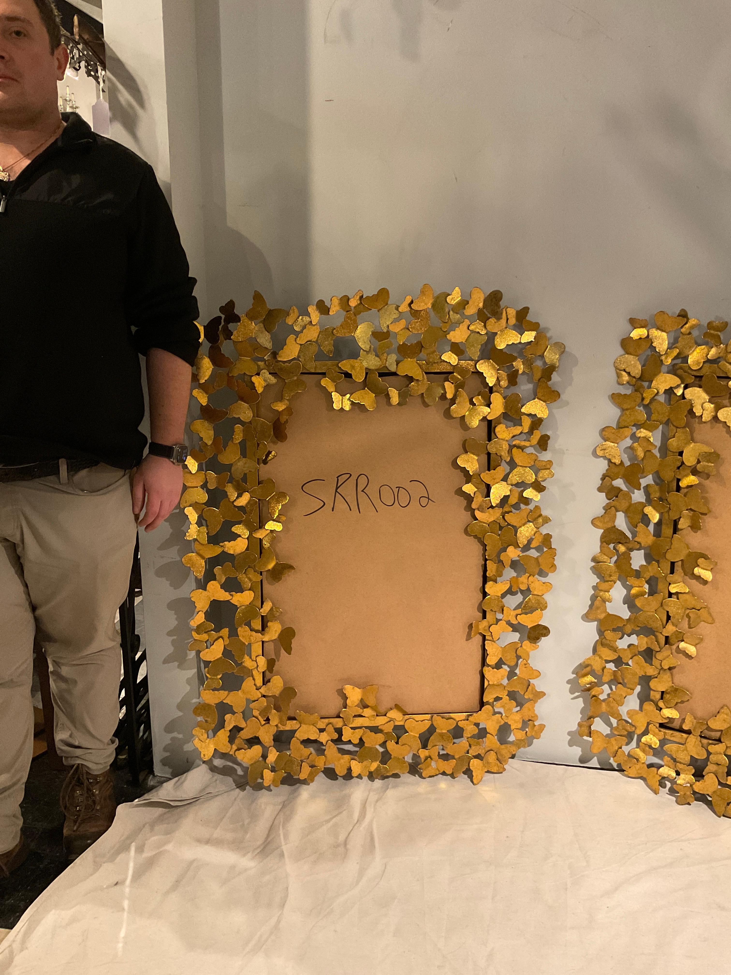 Shimmering gold metal butterflies form the frame. 2 available. Mirror not included  .You must have  mirror made on your own.