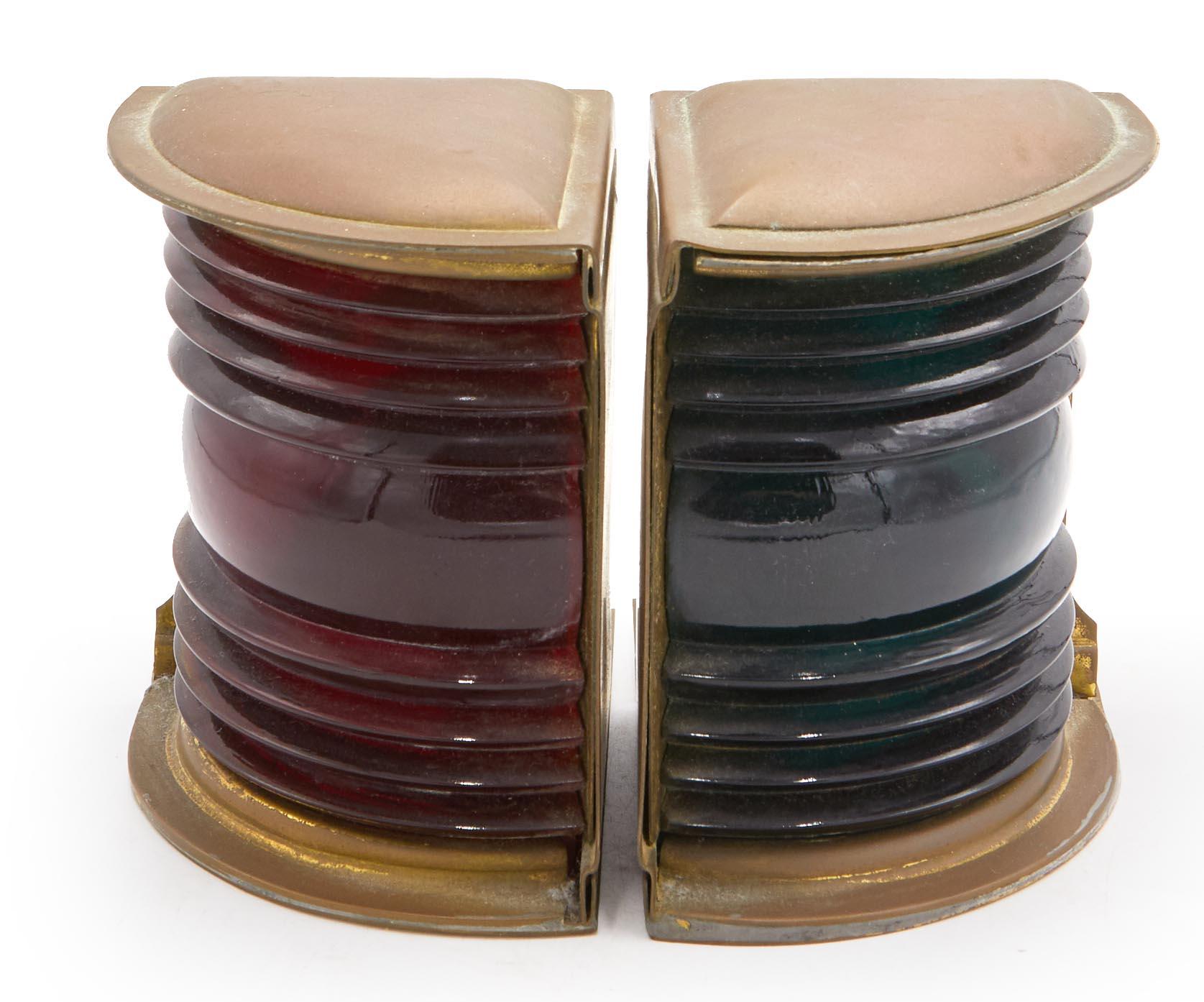 PAIR of 20th-century brass and green and red glass bookends fashioned from ship lanterns (priced as pair).
       