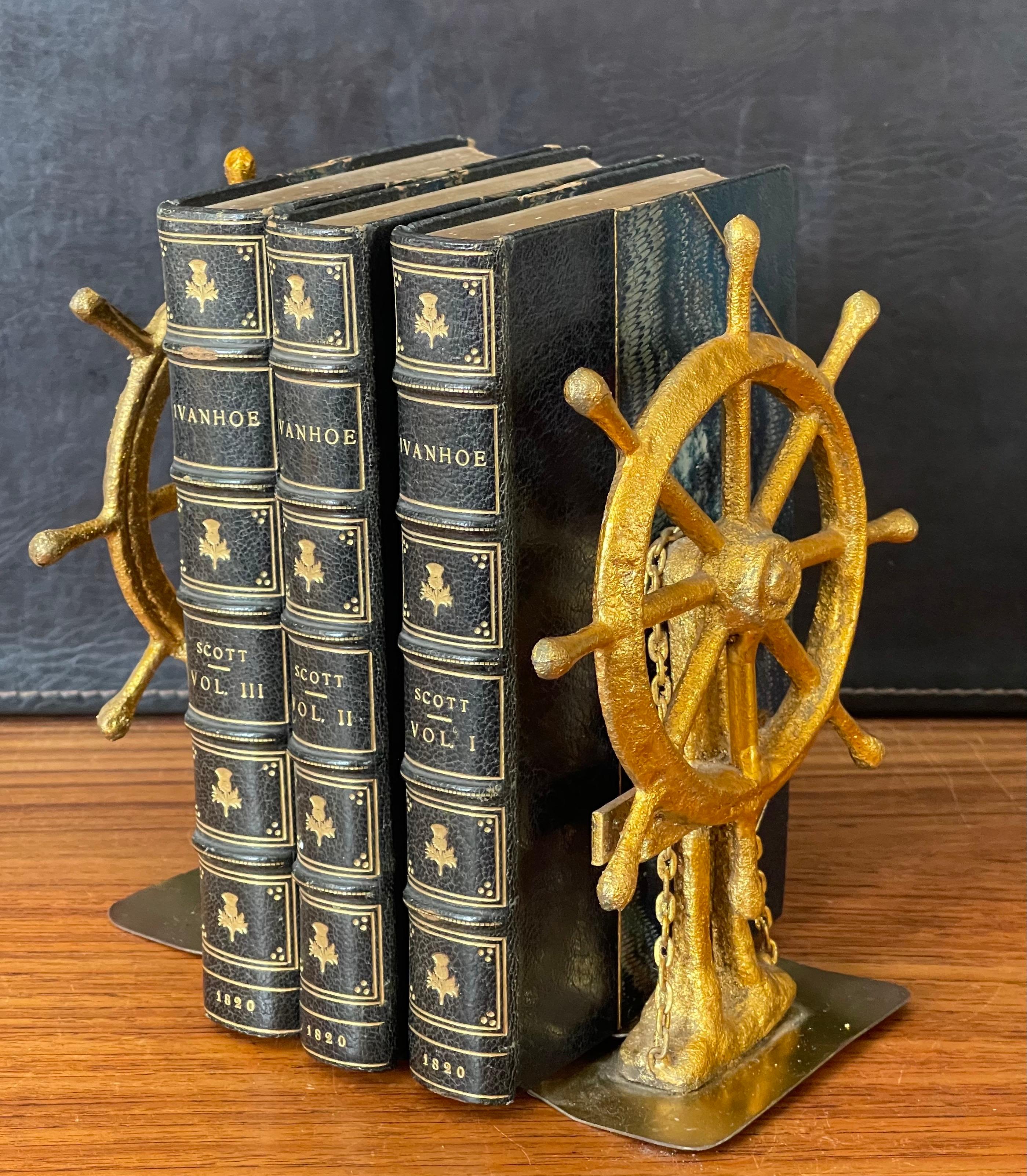 Hollywood Regency Pair of Ship Wheel Bookends in Gold Leaf Finish by Curtis Jere for Artisan House