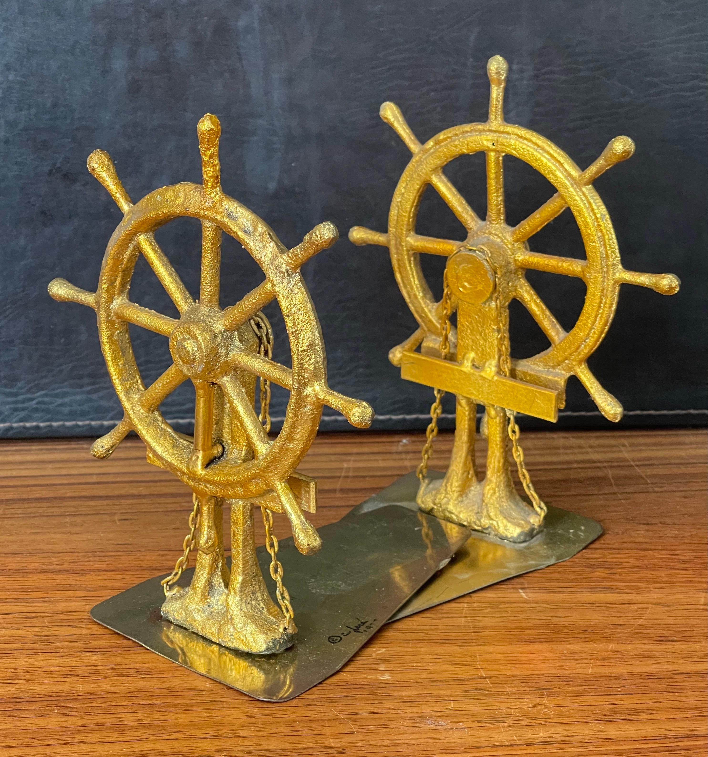 American Pair of Ship Wheel Bookends in Gold Leaf Finish by Curtis Jere for Artisan House