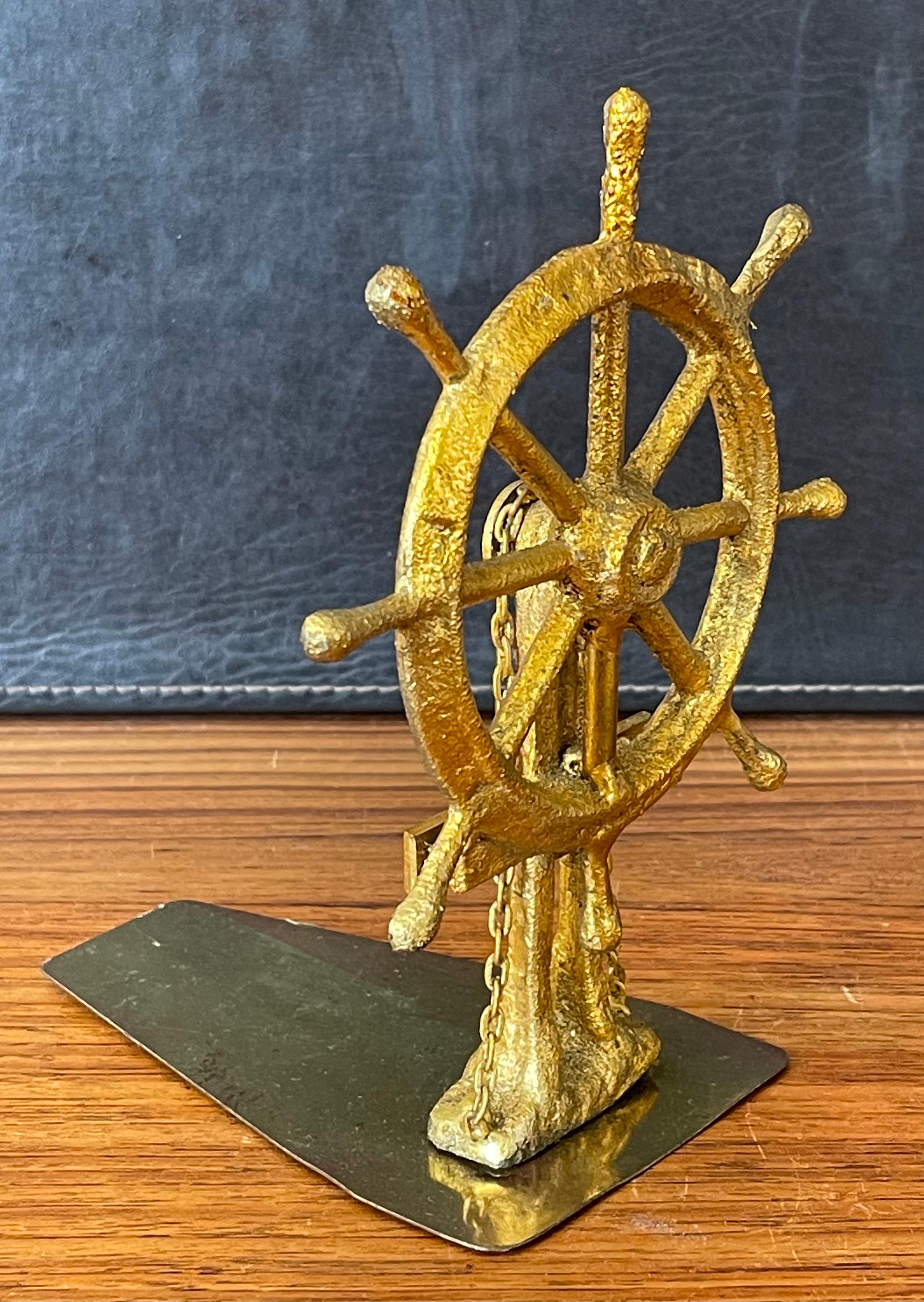 Cut Steel Pair of Ship Wheel Bookends in Gold Leaf Finish by Curtis Jere for Artisan House