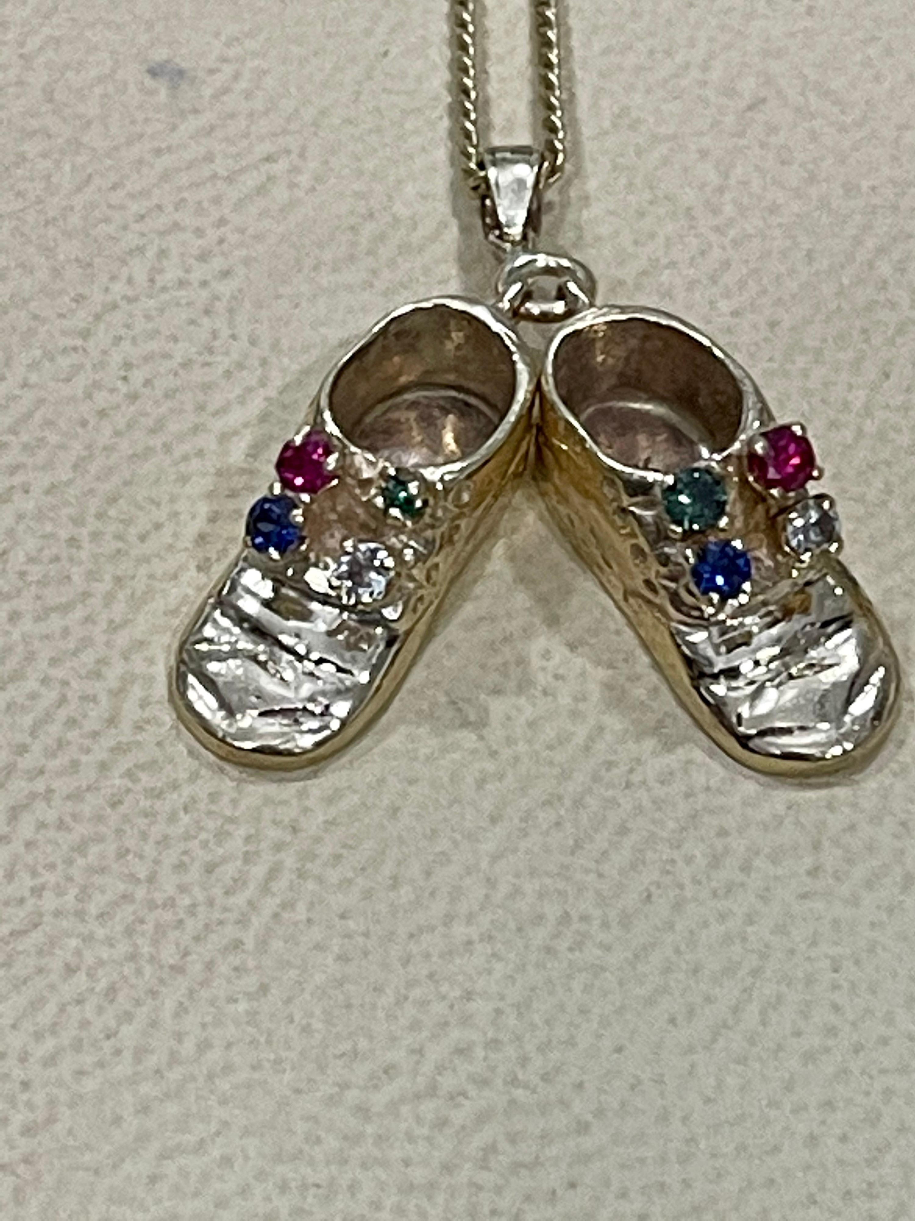  Pair of shoe charms With precious Stone Pendant Necklace With Yellow Gold Chain
This spectacular Pendant Necklace  consisting of a Pair of shoes which can be engraved with your children names.
Right now it has names Gail and Carolyn which can be