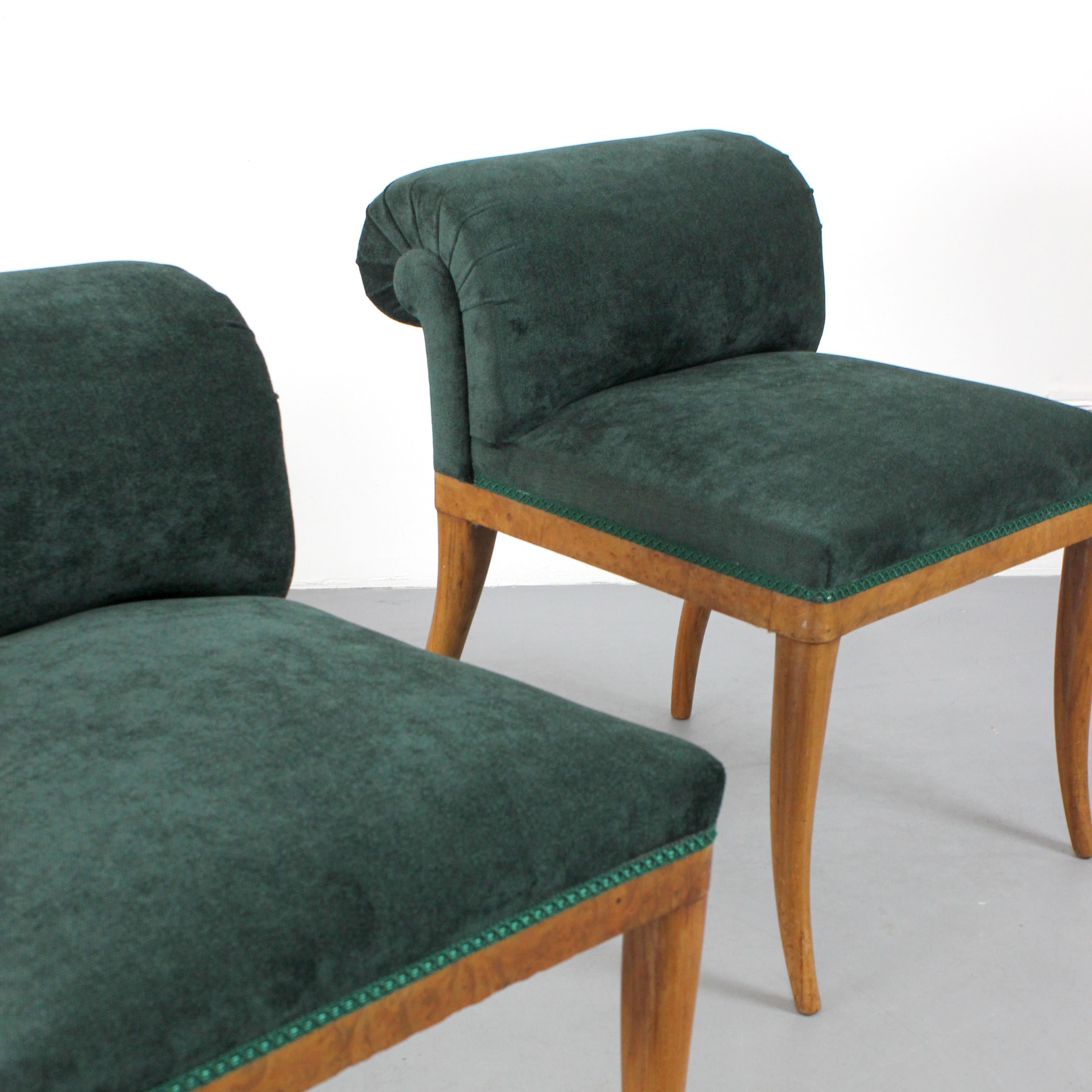 Spanish Pair of shoe racks with a root wood frame and green chenille upholstery For Sale