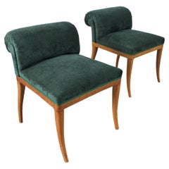 Pair of shoe racks with a root wood frame and green chenille upholstery