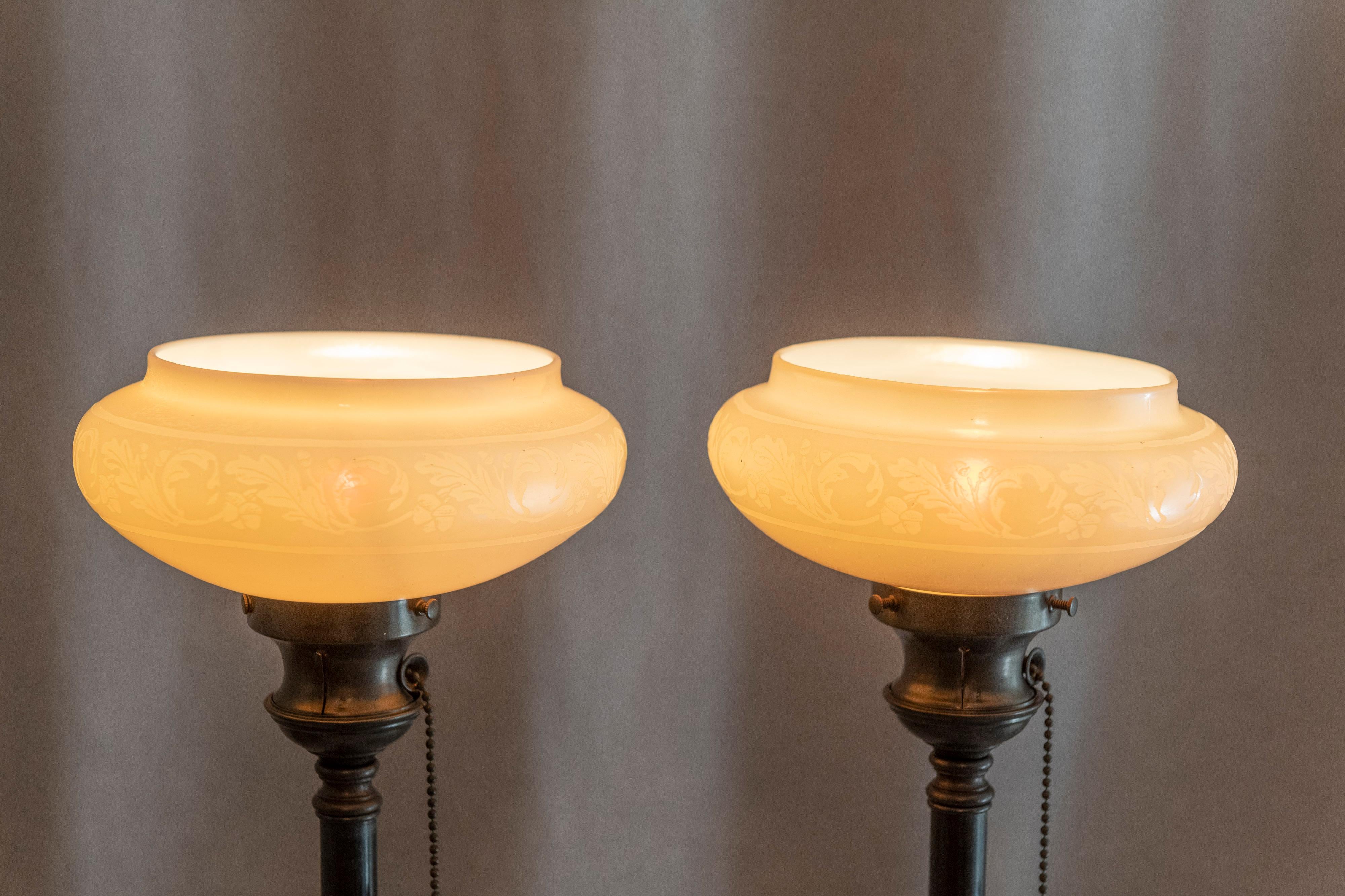 20th Century Pair Of Short Torchiere Lamps, Steuben Calcite Shades, Bronze Bases, ca. 1910