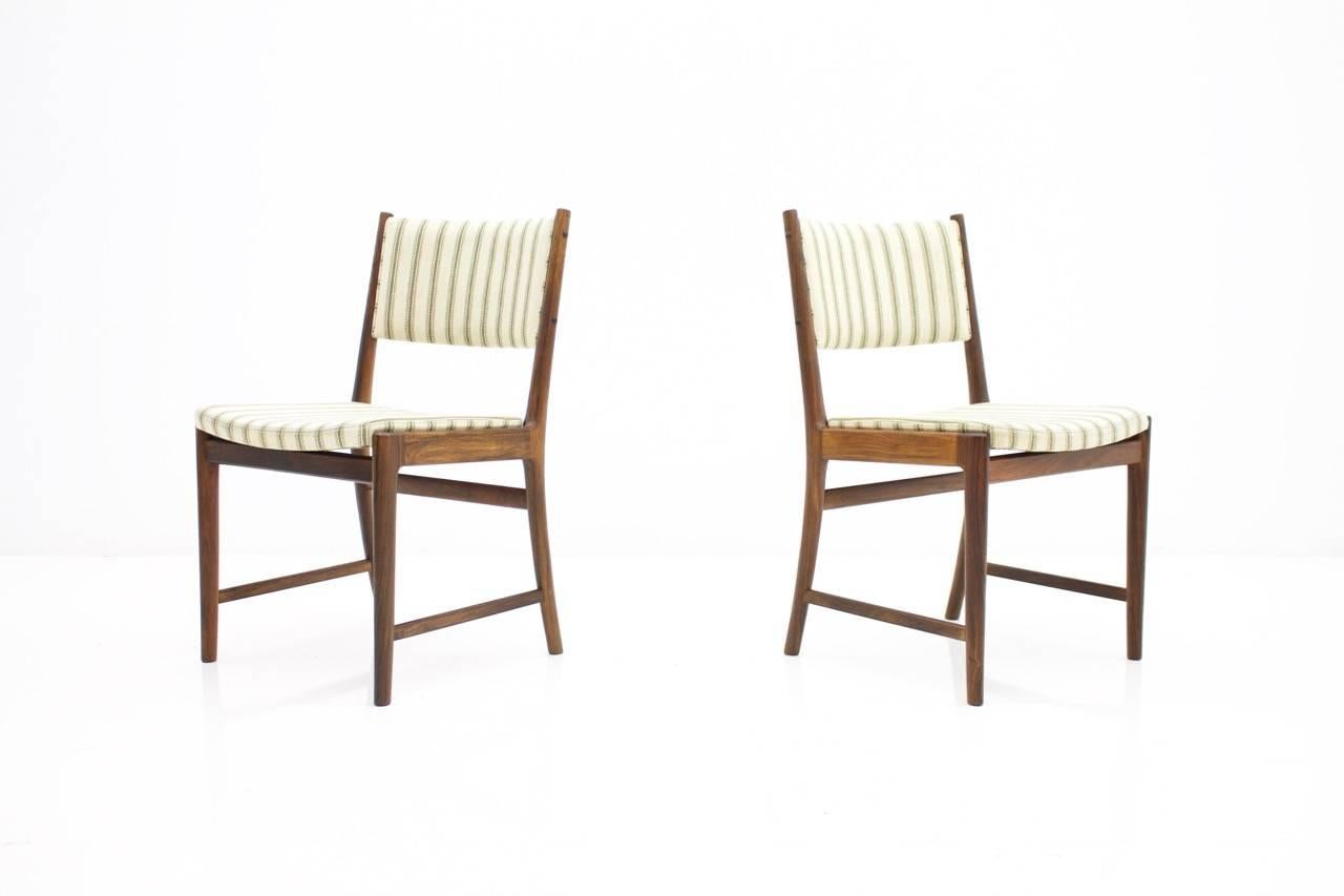 Nice pair of side chairs by Kai Lyngfeldt-Larsen for Søren Willadsen. 
Very good condition with original fabric.