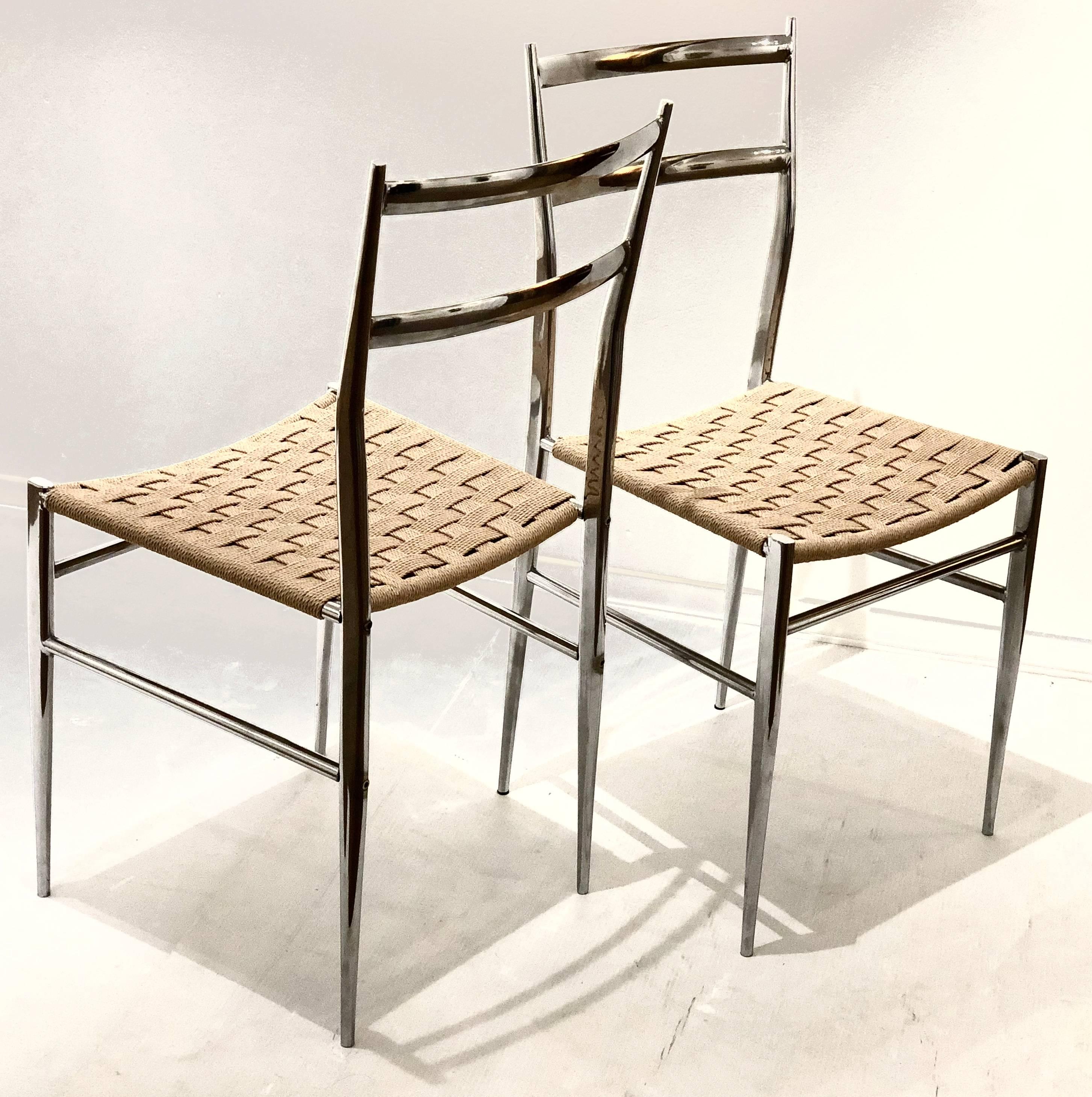 Nice and elegant pair of Superleggera style chairs designed after Gio Ponti by Phillipe Starck for Driade, in chrome frames with natural woven rope seats, freshly rewoven with Danish bone color cord, in very nice and clean condition. Solid and
