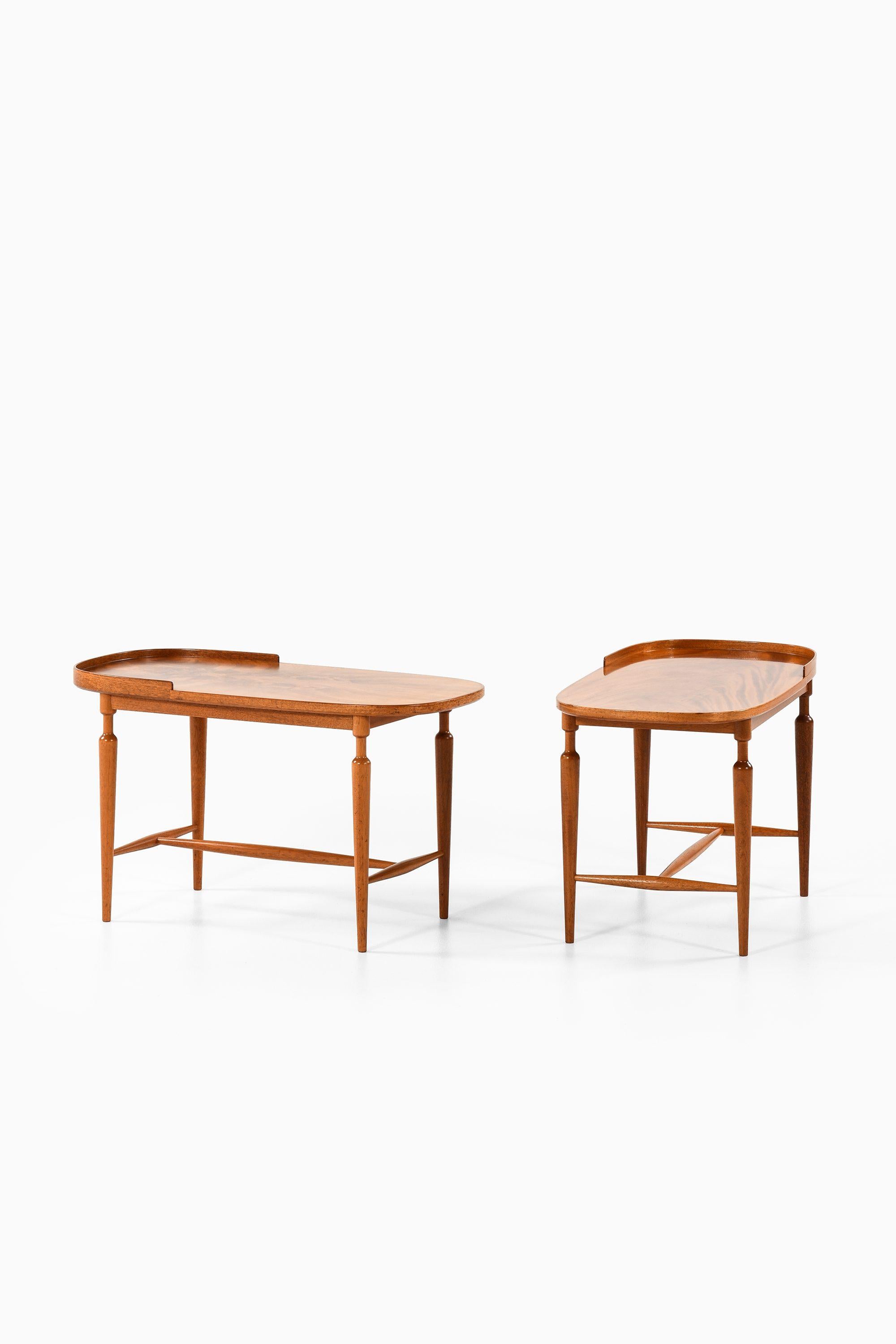 Pair of Side Table in Mahogany by Josef Frank, 1939

Additional Information:
Material: Mahogany
Style: Mid century, Scandinavia
Rare pair of side table model 961 / San Francisco
Produced by Svenskt Tenn in Sweden
Dimensions (W x D x H): 40 x 79.5 x