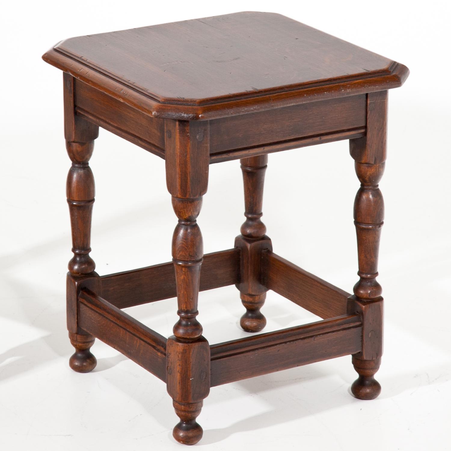 Pair of low side tables out of solid oak, standing on baluster legs with octagonal seats.