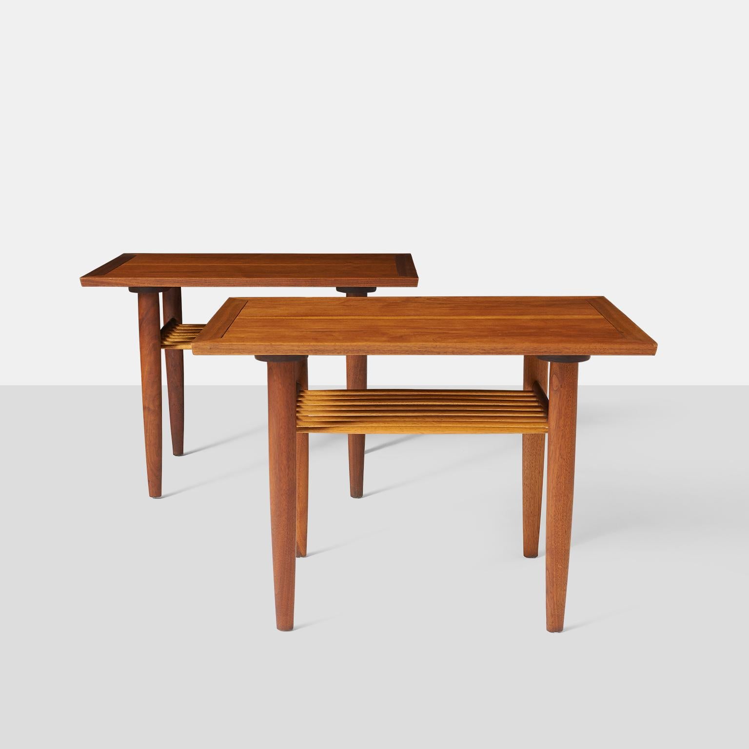 Pair of side tables by George Nakashima for Widdicomb
A pair of rectangular shaped side table with a bordered edge, lower shelf in spindle form, and branded by George Nakashima with the original Widdicomb label. Made in solid walnut.
USA, circa