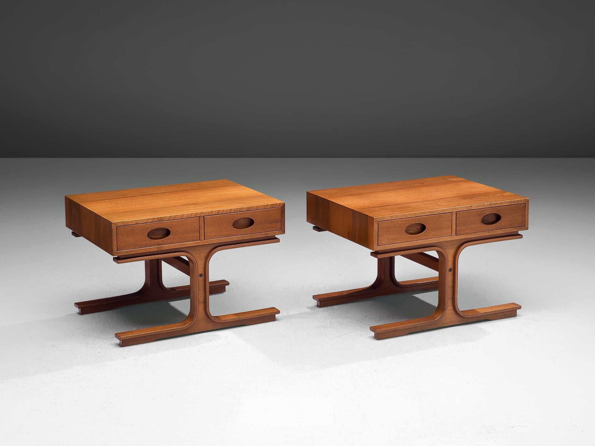 Gianfranco Frattini for Bernini, pair of side tables, walnut, Italy, 1960s.

Stunning pair of side tables by Gianfranco Frattini that feature his typical design traits. For instance, the two drawers with stretched handle but also the legs that