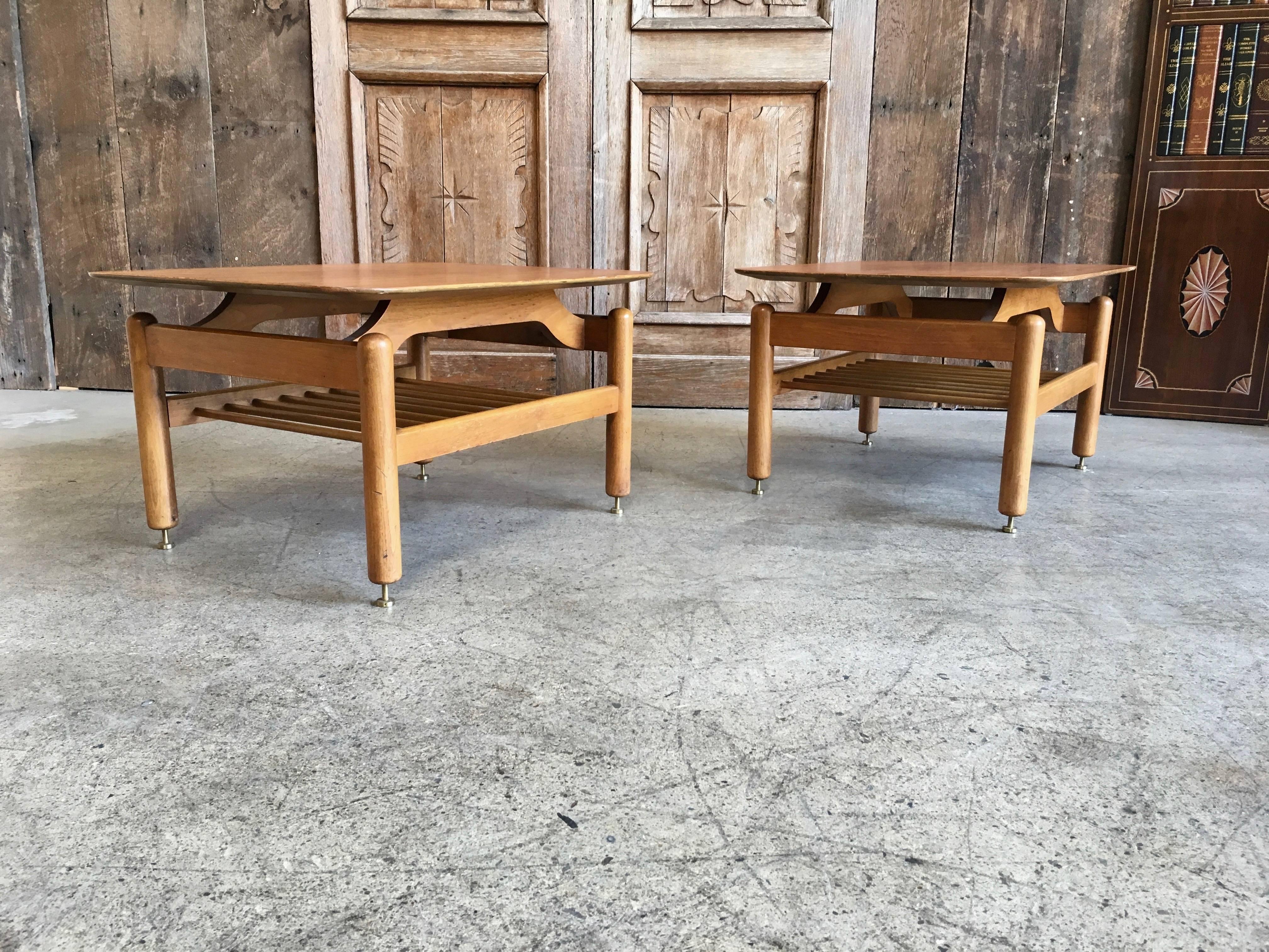A very nice pair of walnut side tables designed by Greta Grossman for Glenn of California in the 1950s. Original finish.