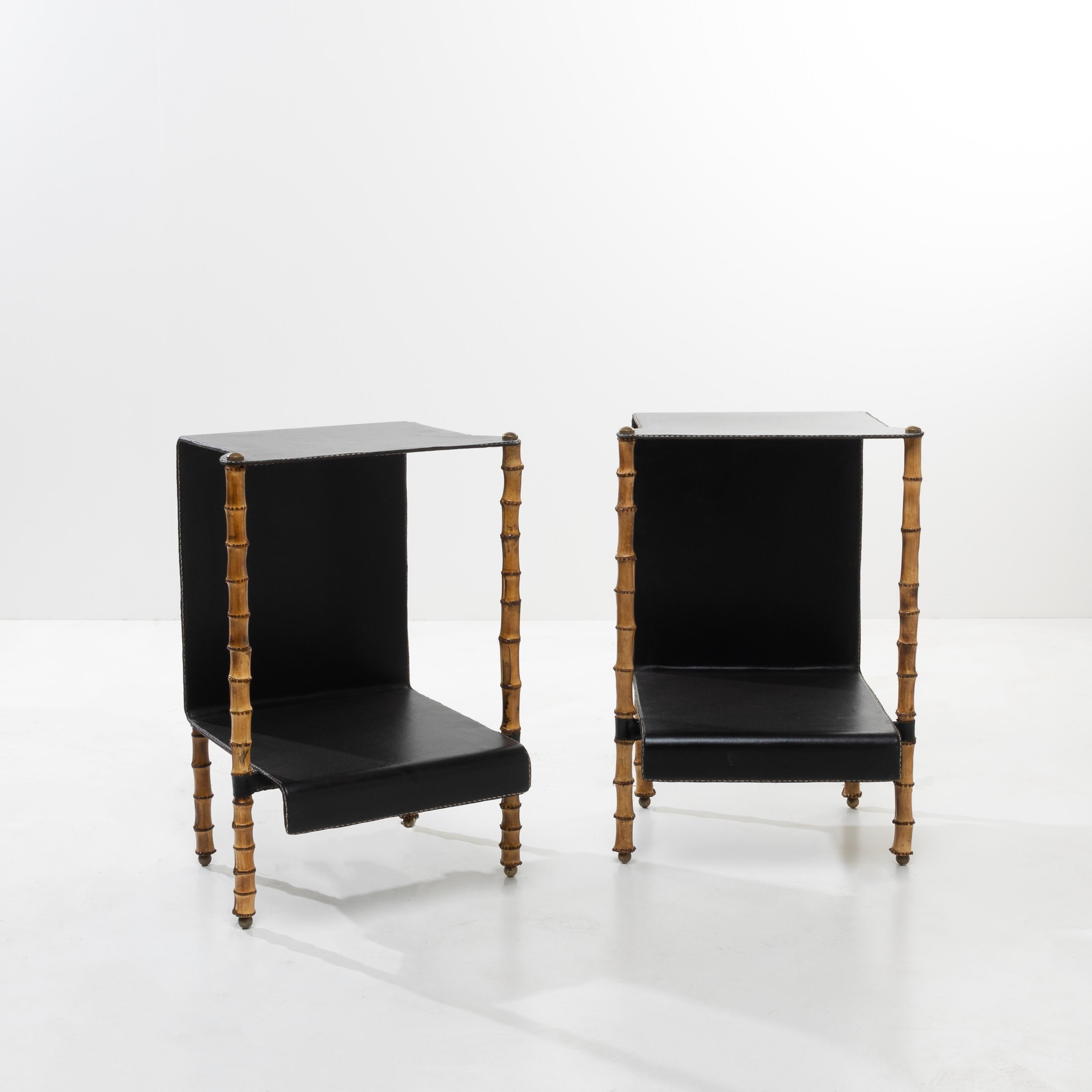 Pair of side tables in steel entirely covered in saddle stitched leather.
Particularly elegant in shape, these tables are made of a single sheet of steel forming the top, bottom and back of the table.
The steel sheet is then covered with saddle