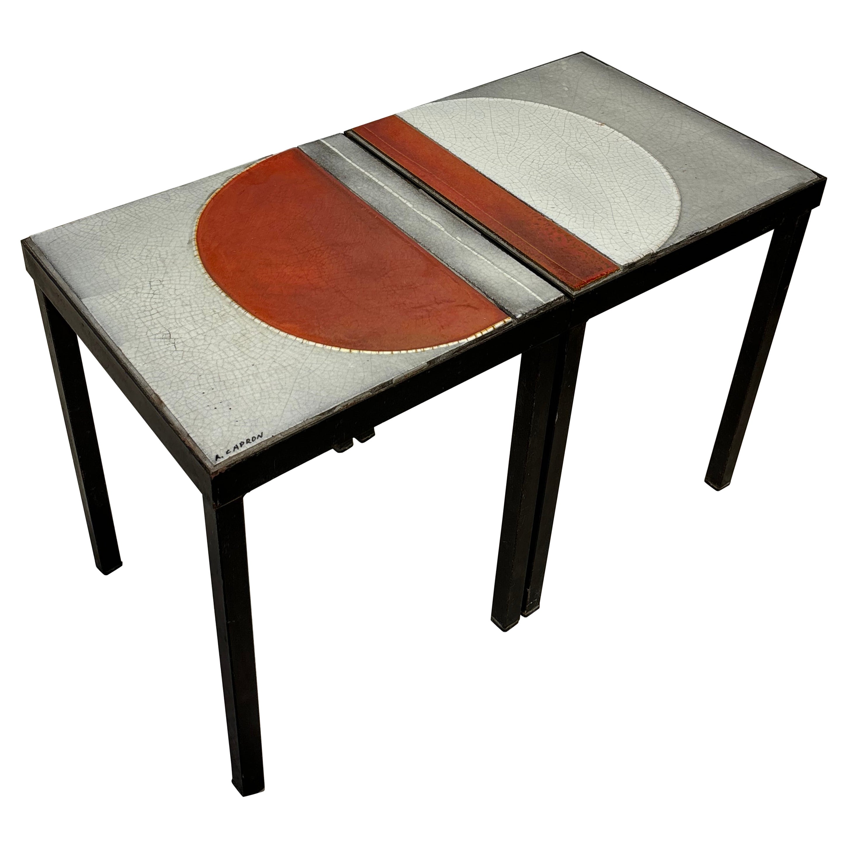 Pair of side tables by Roger Capron in vendita